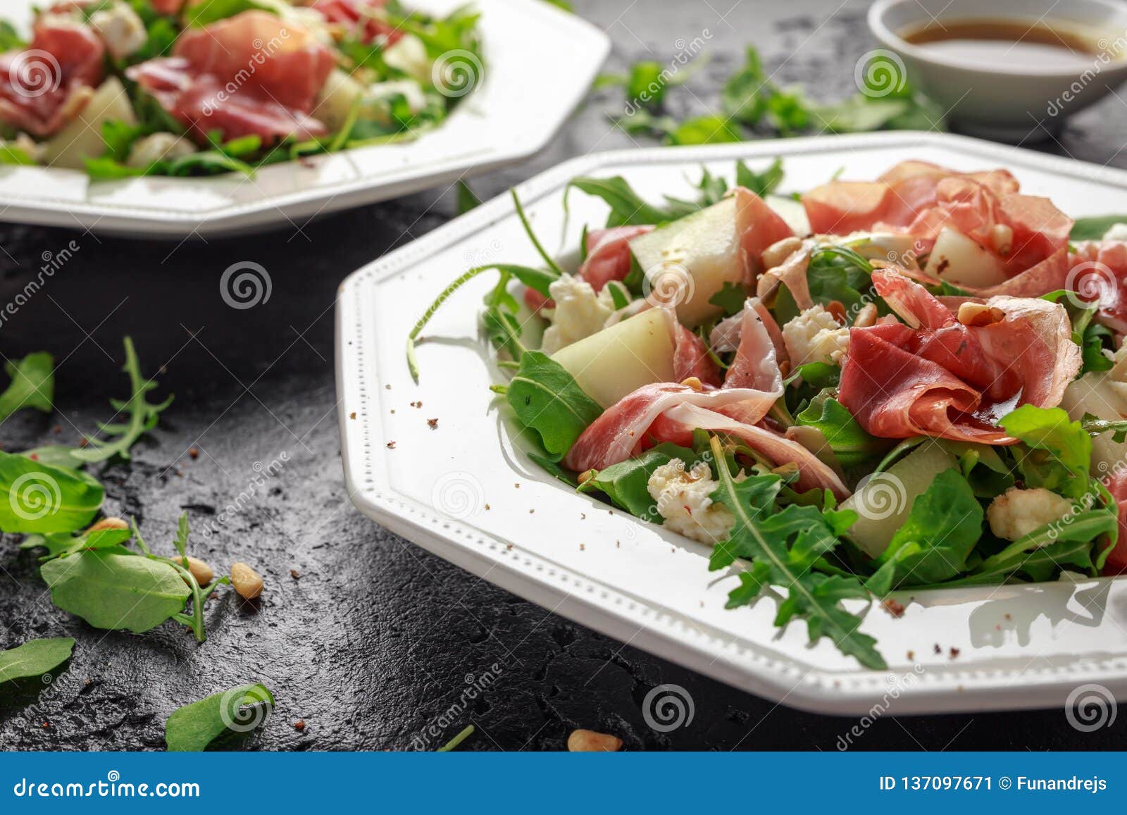 Parma Ham and Melon Salad with Mozzarella, Rocket and Pine Nuts Stock