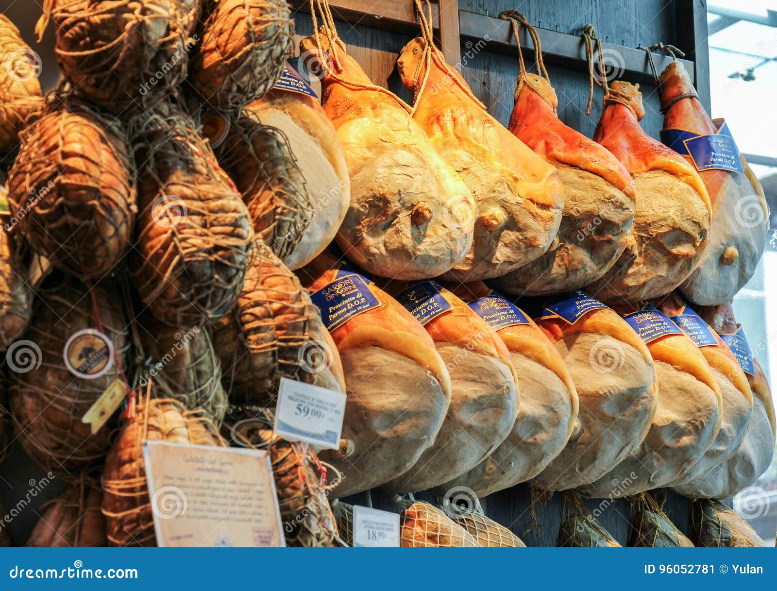 Prosciutto Hams And Salami Displayed In A Traditional Butcher Shop ...