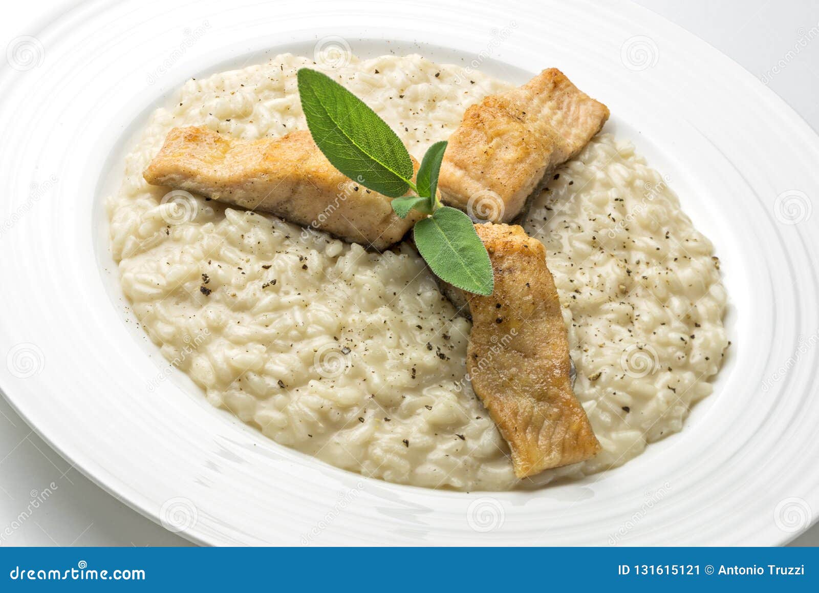 Parmesan Risotto Dish with Trout Fillet Isolated on White Background