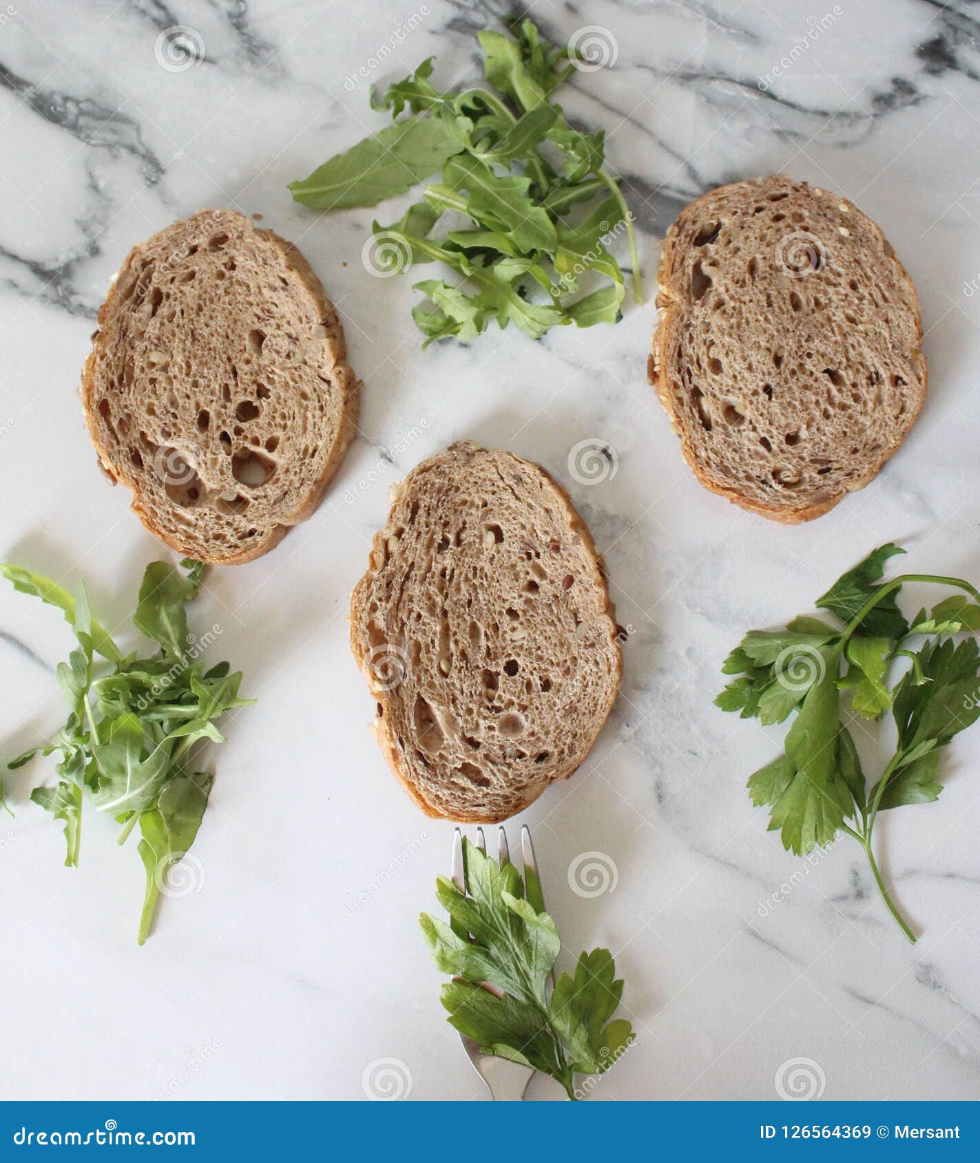parsley and arugula with full grain bread