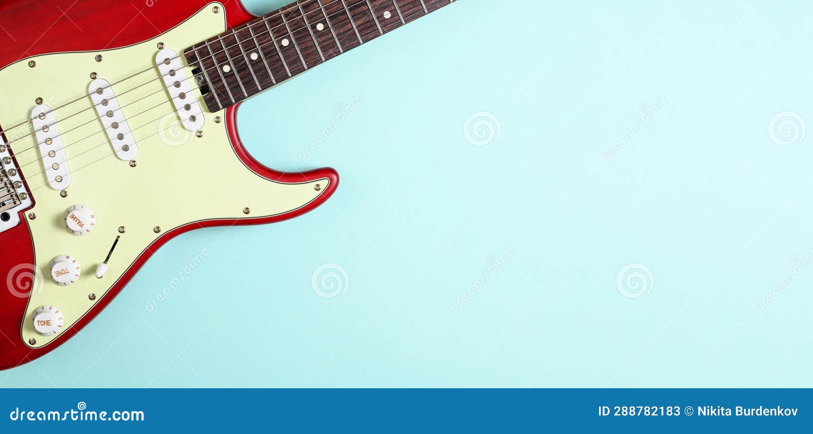 Part of an Electric Guitar on a Blue Background. Stock Image Image of