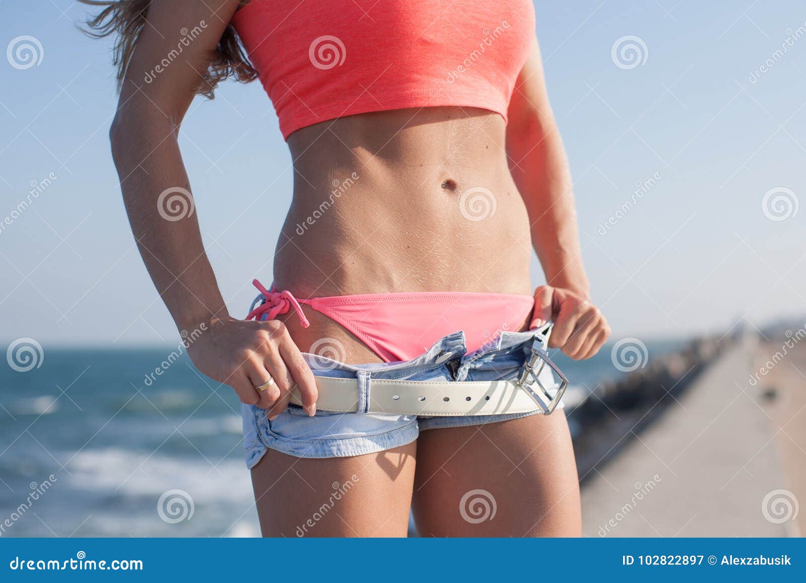 Part of Torso of Attractive Young Woman with Sagging Pants Stock Image -  Image of fragment, akimbo: 102822897