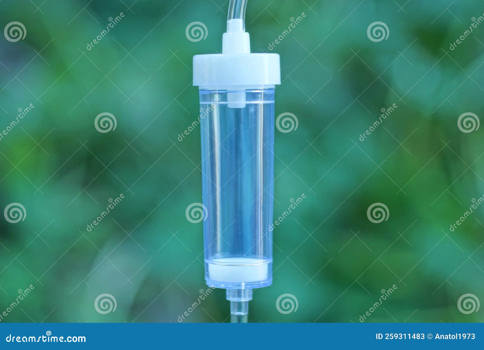 Part of a White Medical Dropper with a Small Empty Plastic Container