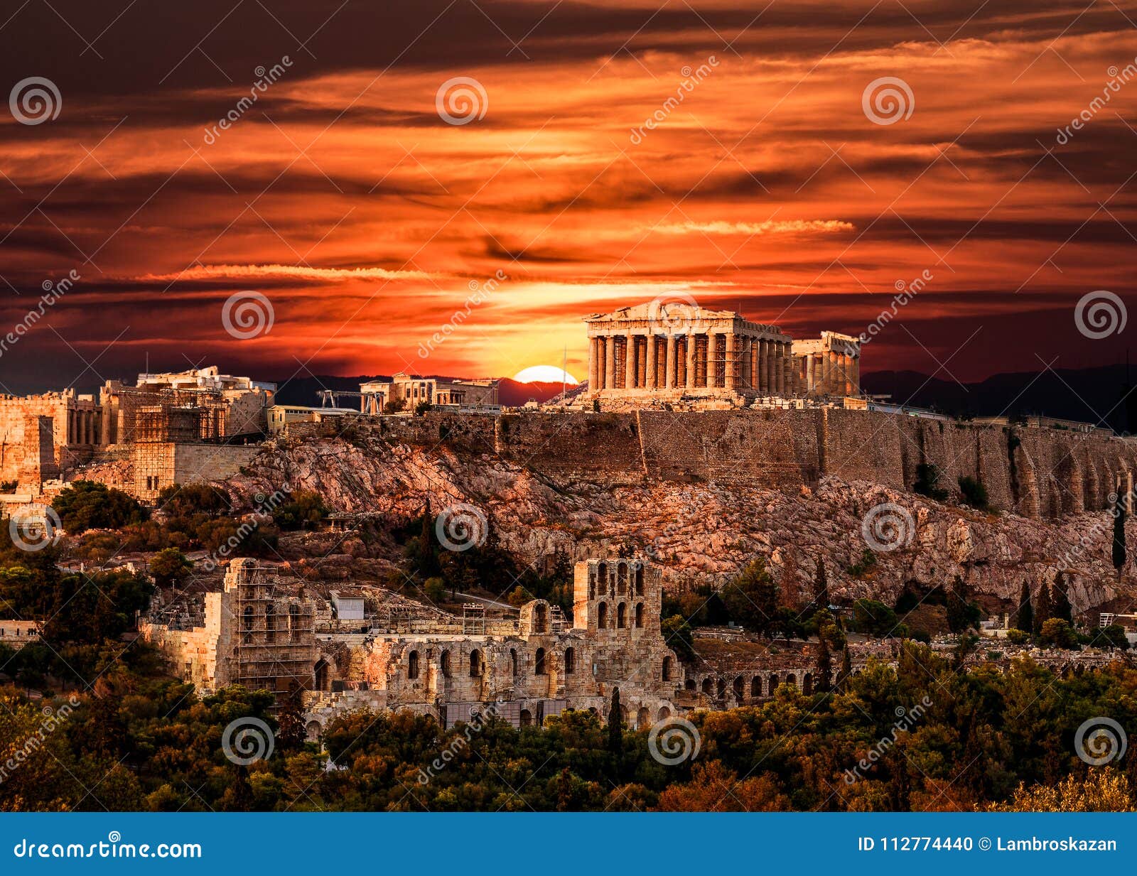 parthenon, acropolis of athens, under dramatic sunset sky of greece