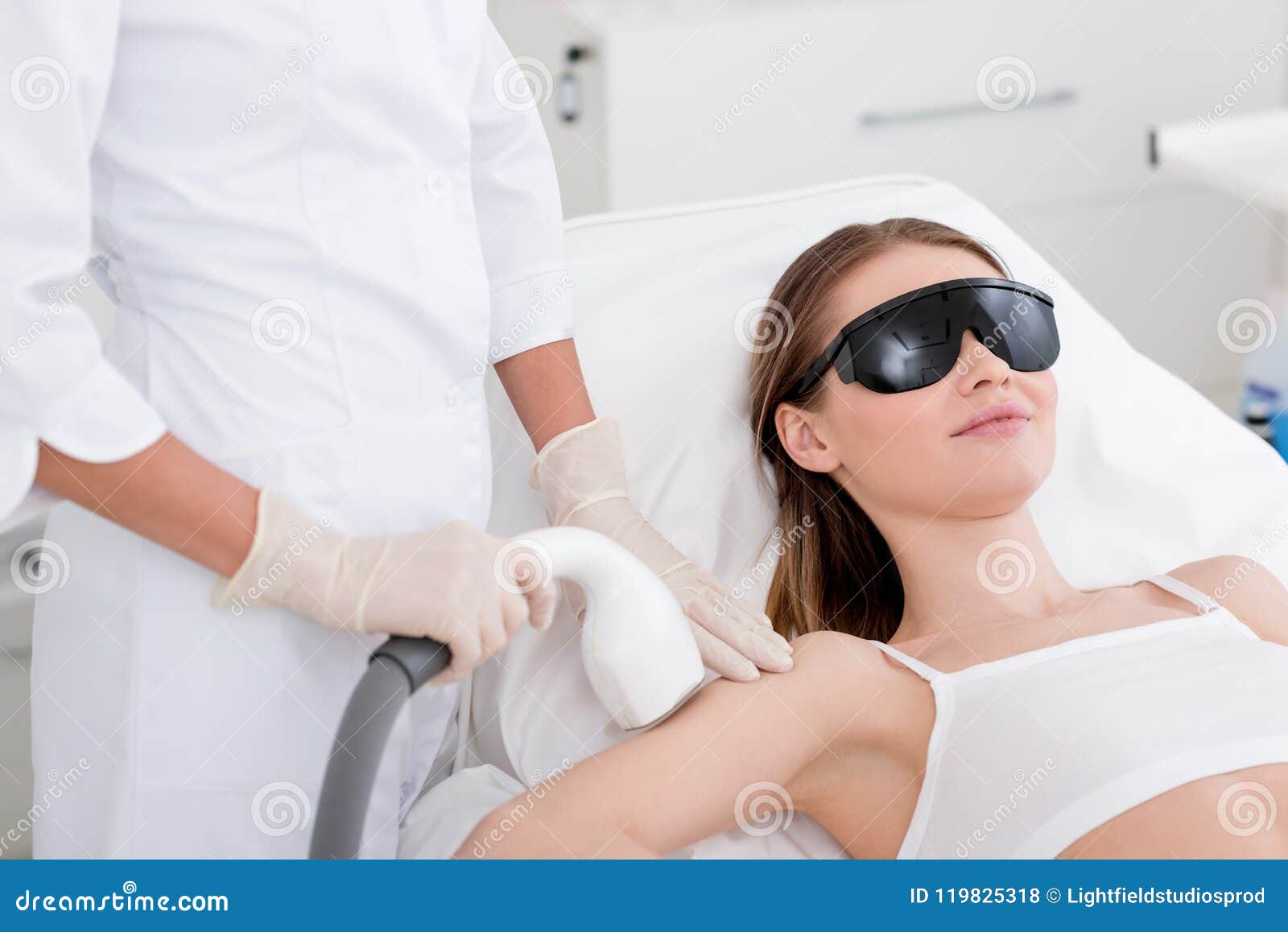 Partial View Of Woman Receiving Laser Hair Removal