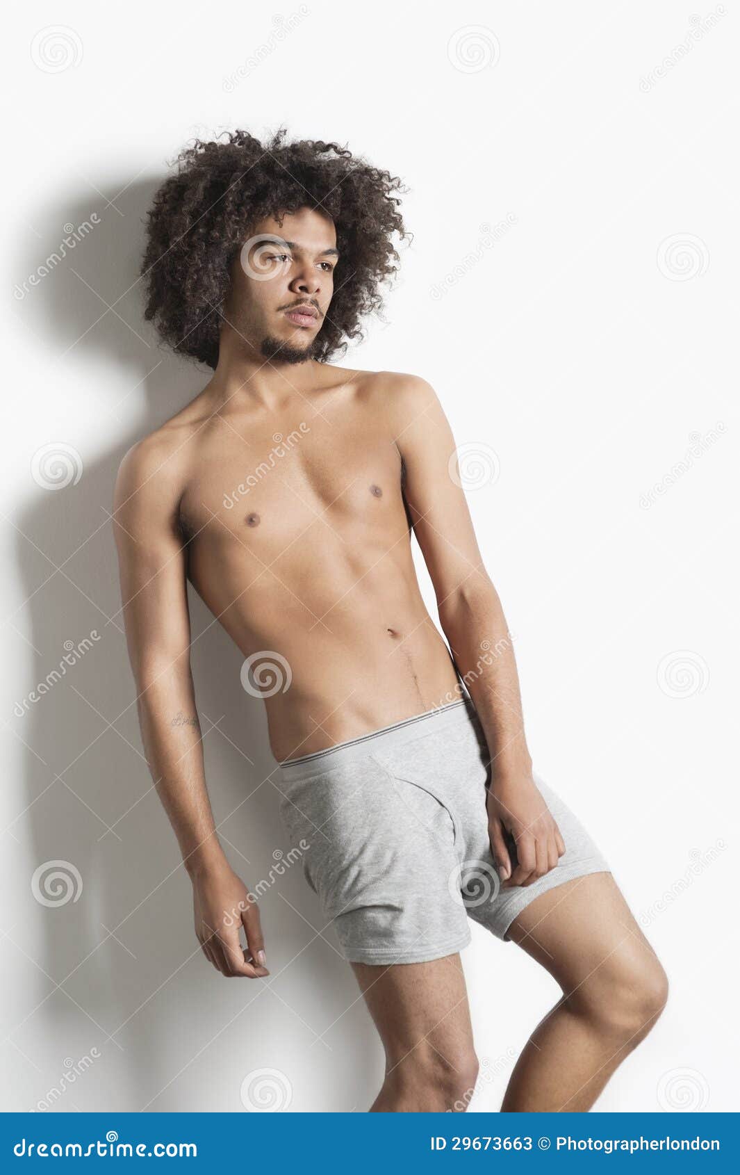 Partially Nude Young Man with Curly Hair Posing Over White Background Stock Image - Image of underwear, away: 29673663 Partially Nude Young Man with Curly Hair Posing Over White Background Stock Image - Image of underwear, away: 29673663