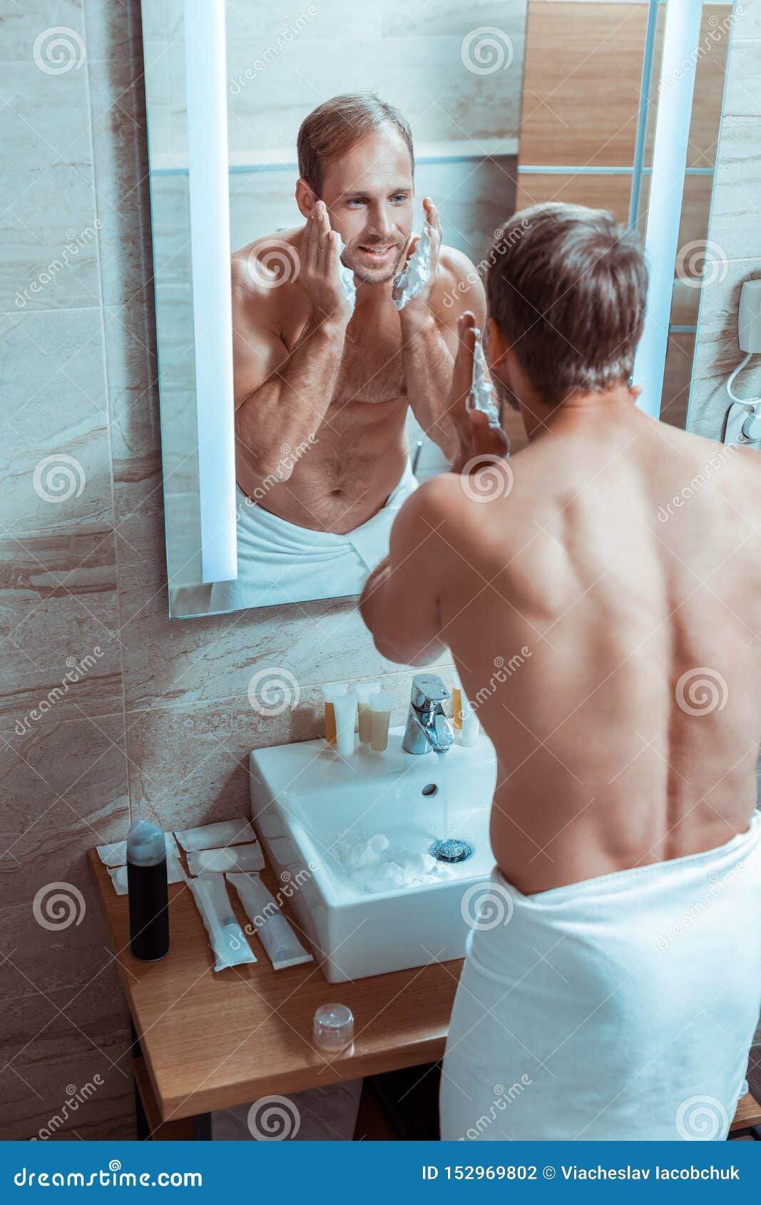 Naked Man Shaving Himself