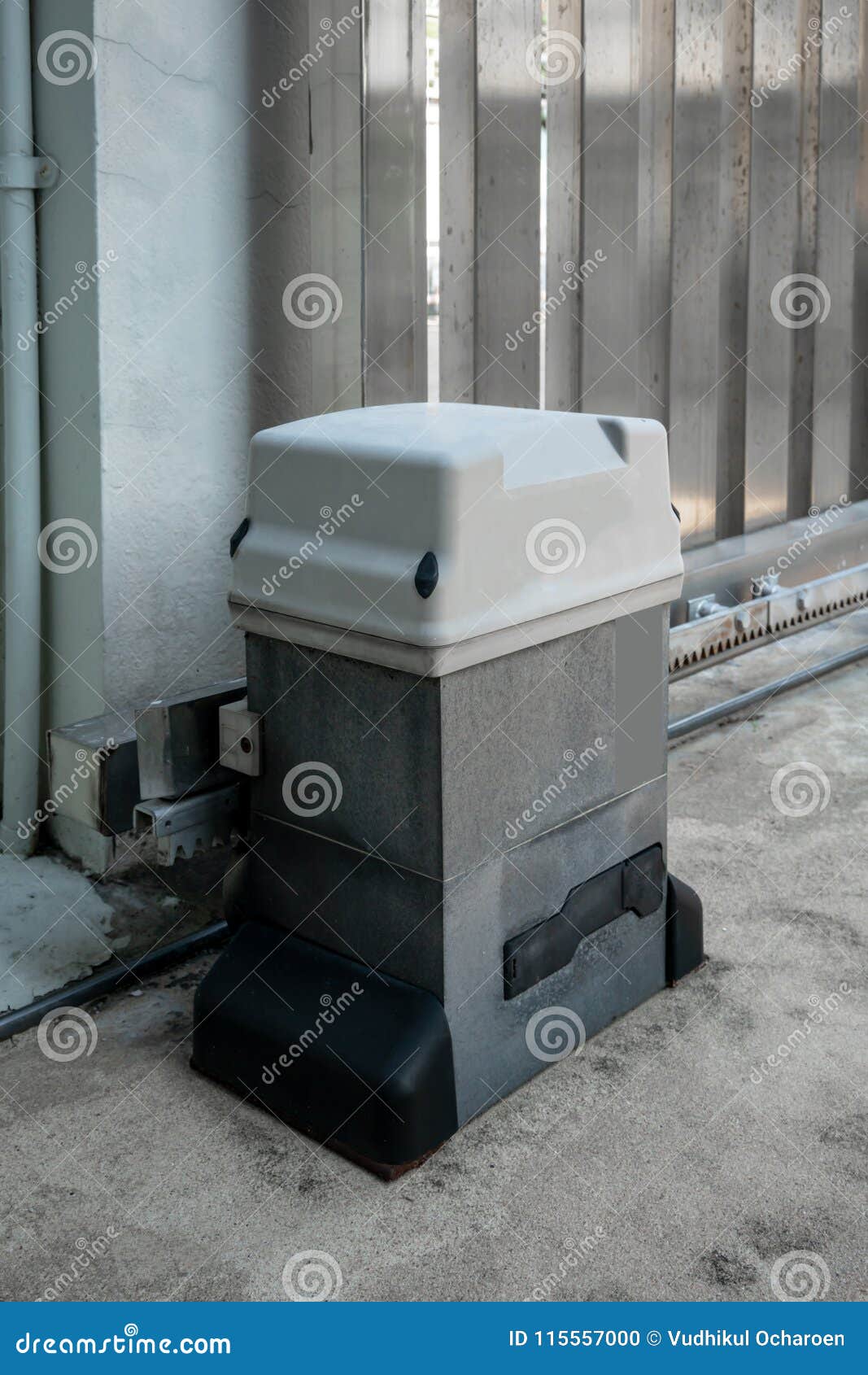 Parts of Sliding Gate System. Automatic Doors and Motor. Stock Photo