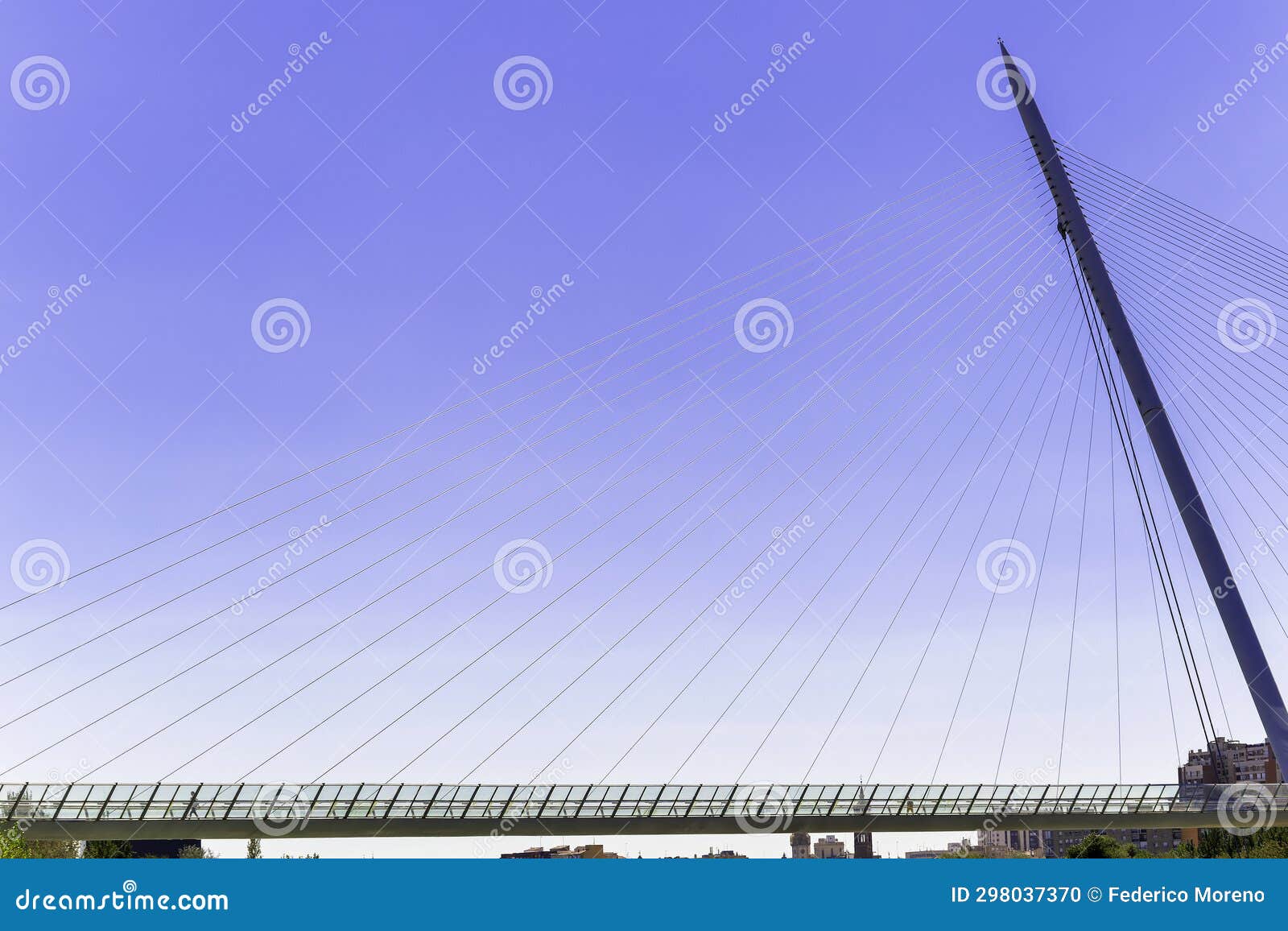 pasarela del voluntariado. side view. modern bridge over a blue sky in zaragoza