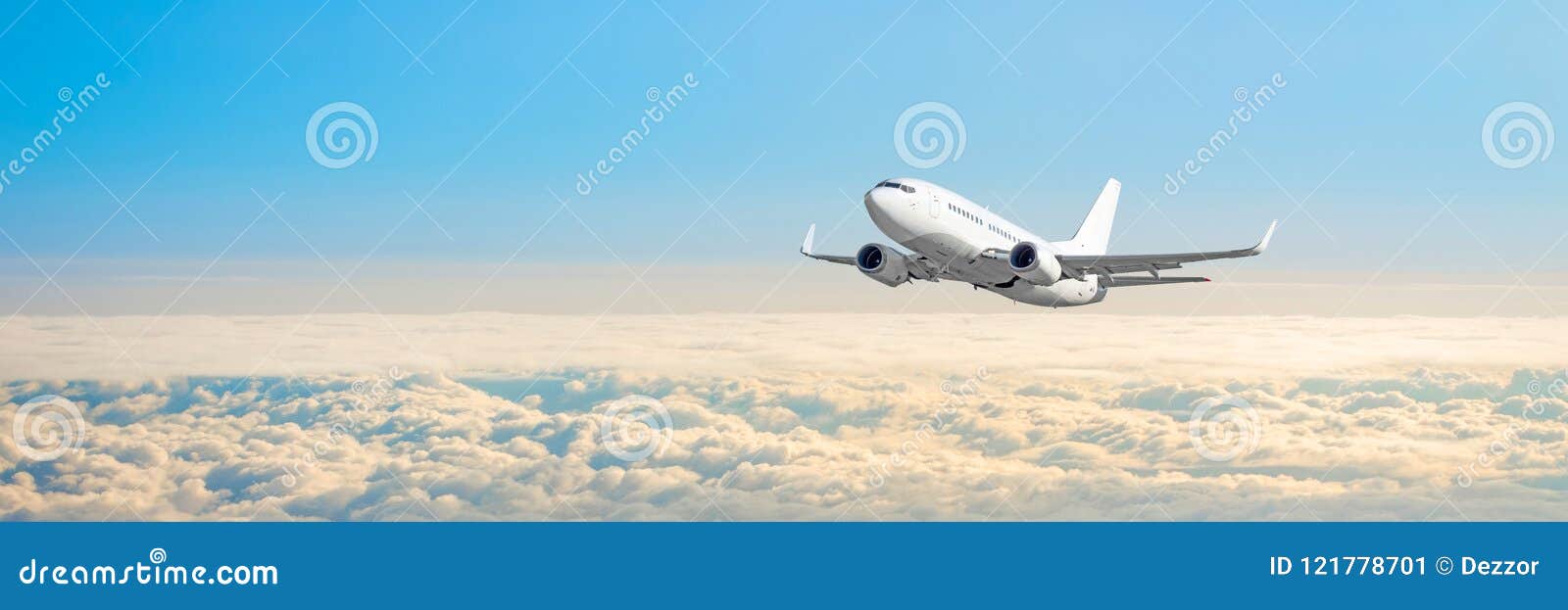 passenger aircraft cloudscape with white airplane is flying in the daytime sky overcast, panorama view.