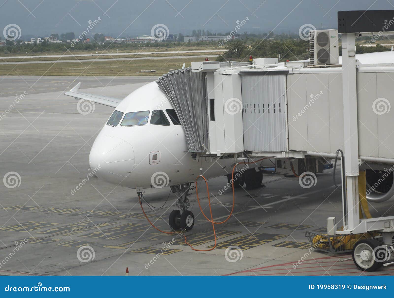Passenger Airplane Docking To the Gate Terminal Stock Image Image of