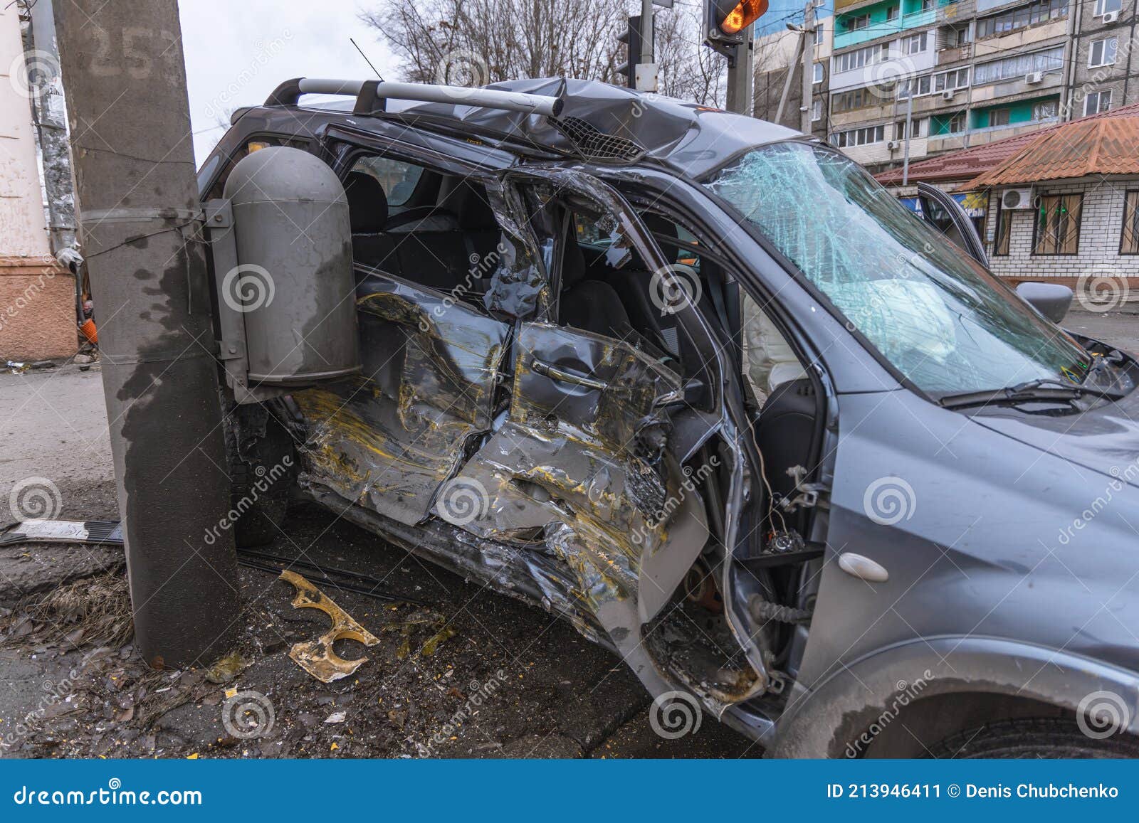 A Passenger Car Crashed into a Pole. Dented Side Doors Stock Image