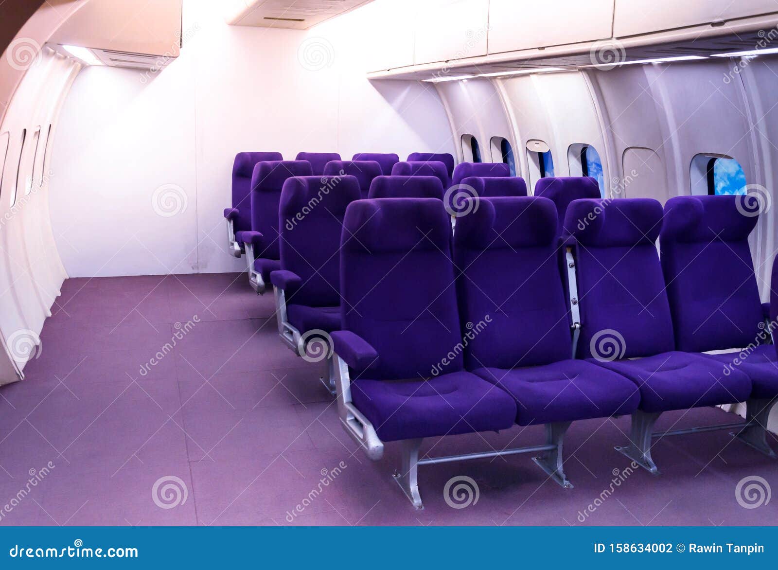 passenger seats in the aircraft.view from inside of the plane,the airplane`s seats