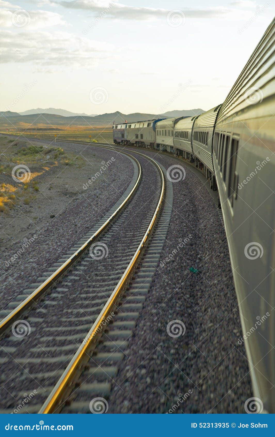 Passenger Train Traveling into the Arizona Sunset Stock Image Image
