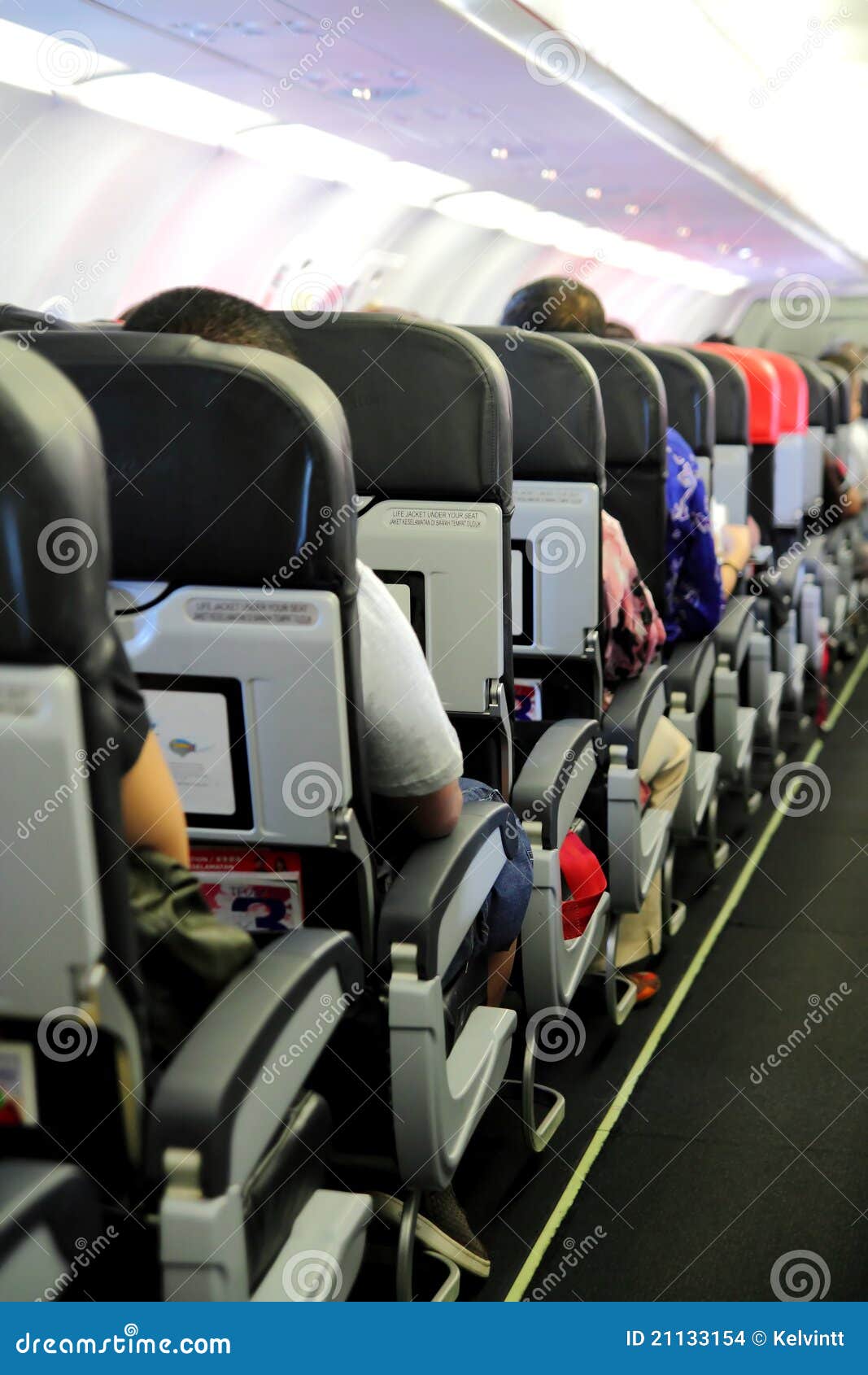 passengers in airplane cabin