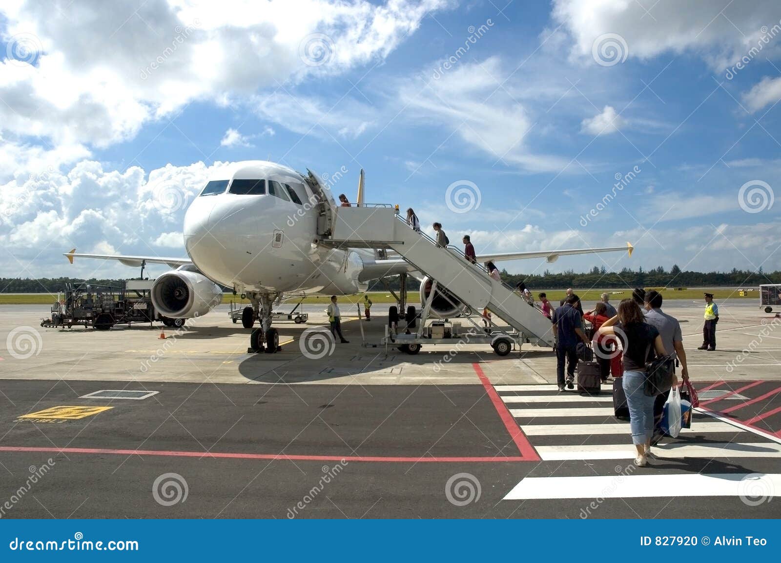 passengers boarding a plane