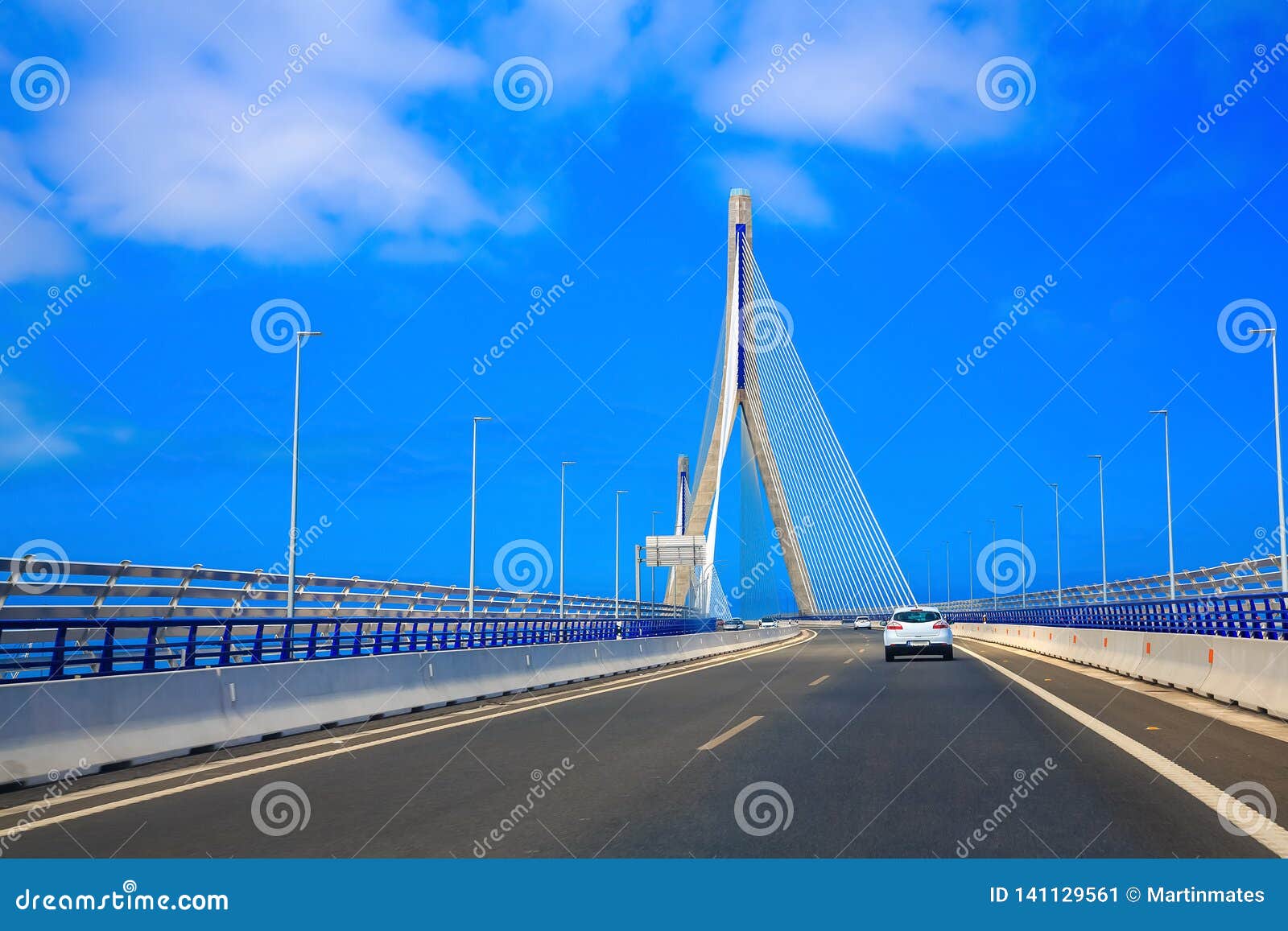 passing the bridge la pepa in cÃ¡diz during a sunny day with blue sky