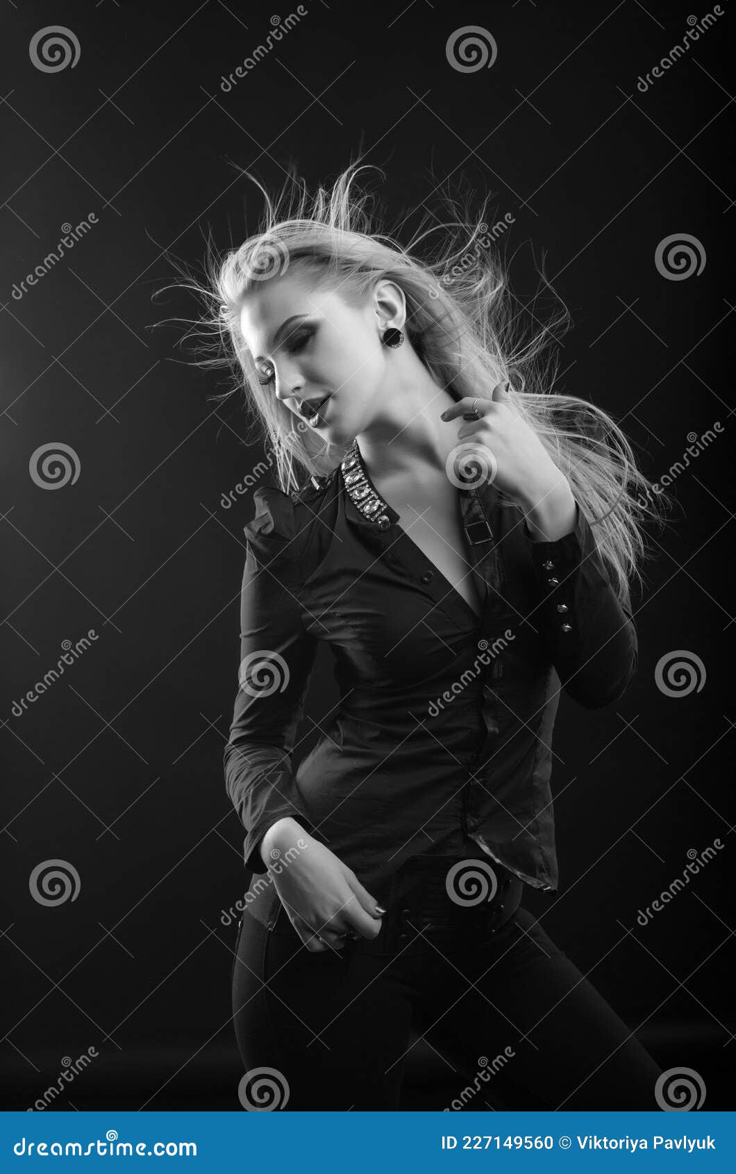 Passionate Blond Woman with Long Fluttering Hair Posing at Studio Stock ...