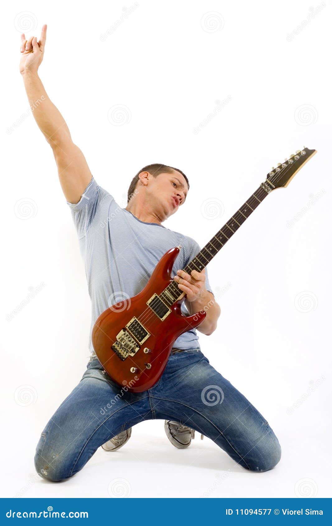 Guitar man in classic rock pose Stock Photo by ©feedough 21940595