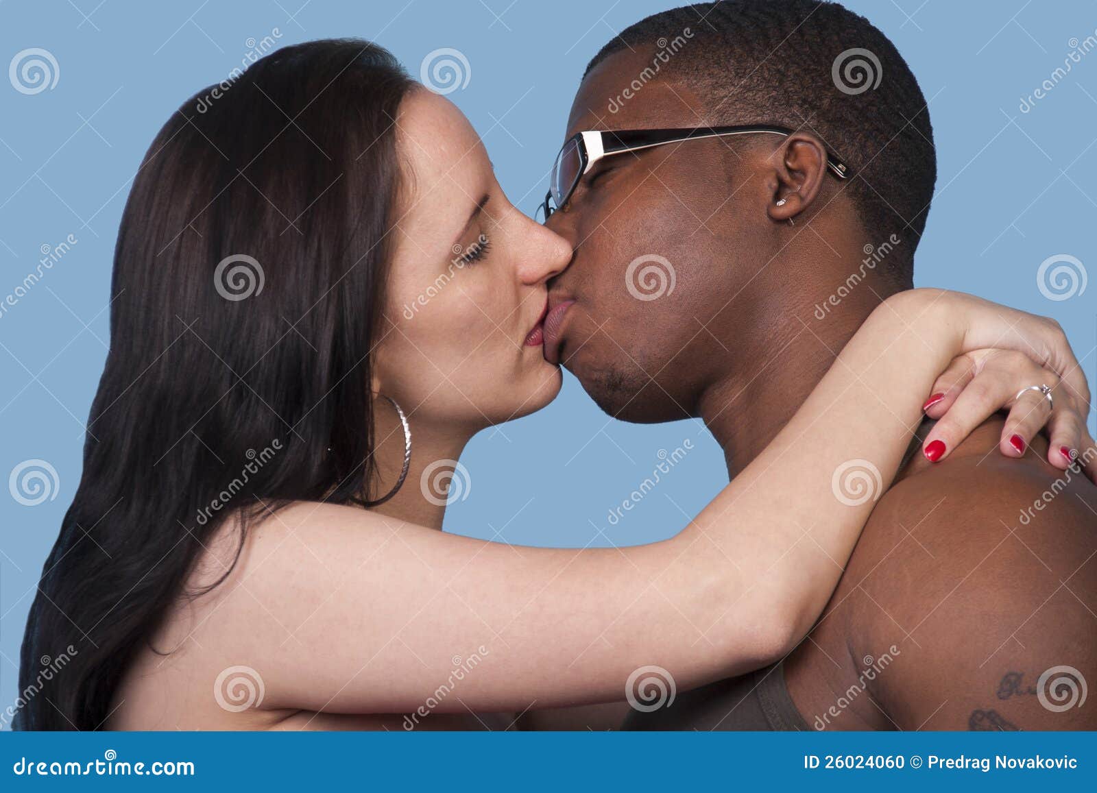 Passionate Kiss a White Woman and Black Man Stock Photo pic