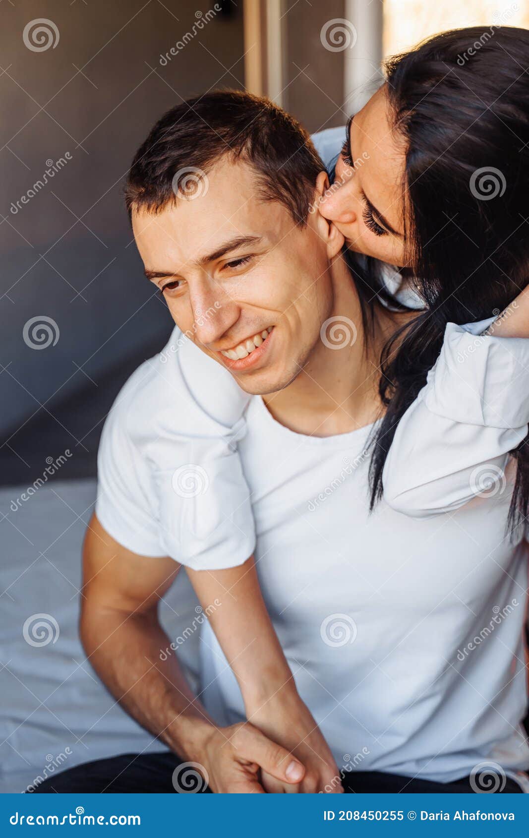 Man Kissing Woman Underwear Stock Photos pic picture