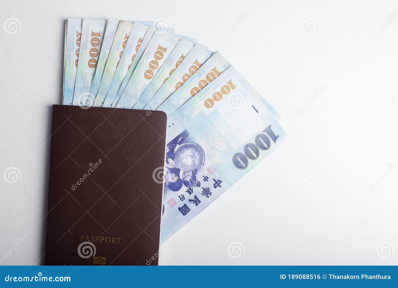 passport-and-1000-new-taiwan-dollar-bill-on-white-background-stock