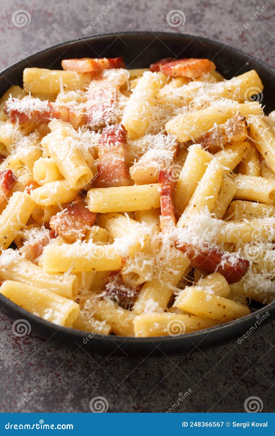 Pasta Alla Gricia Rigatoni with Guanciale Closeup in the Plate