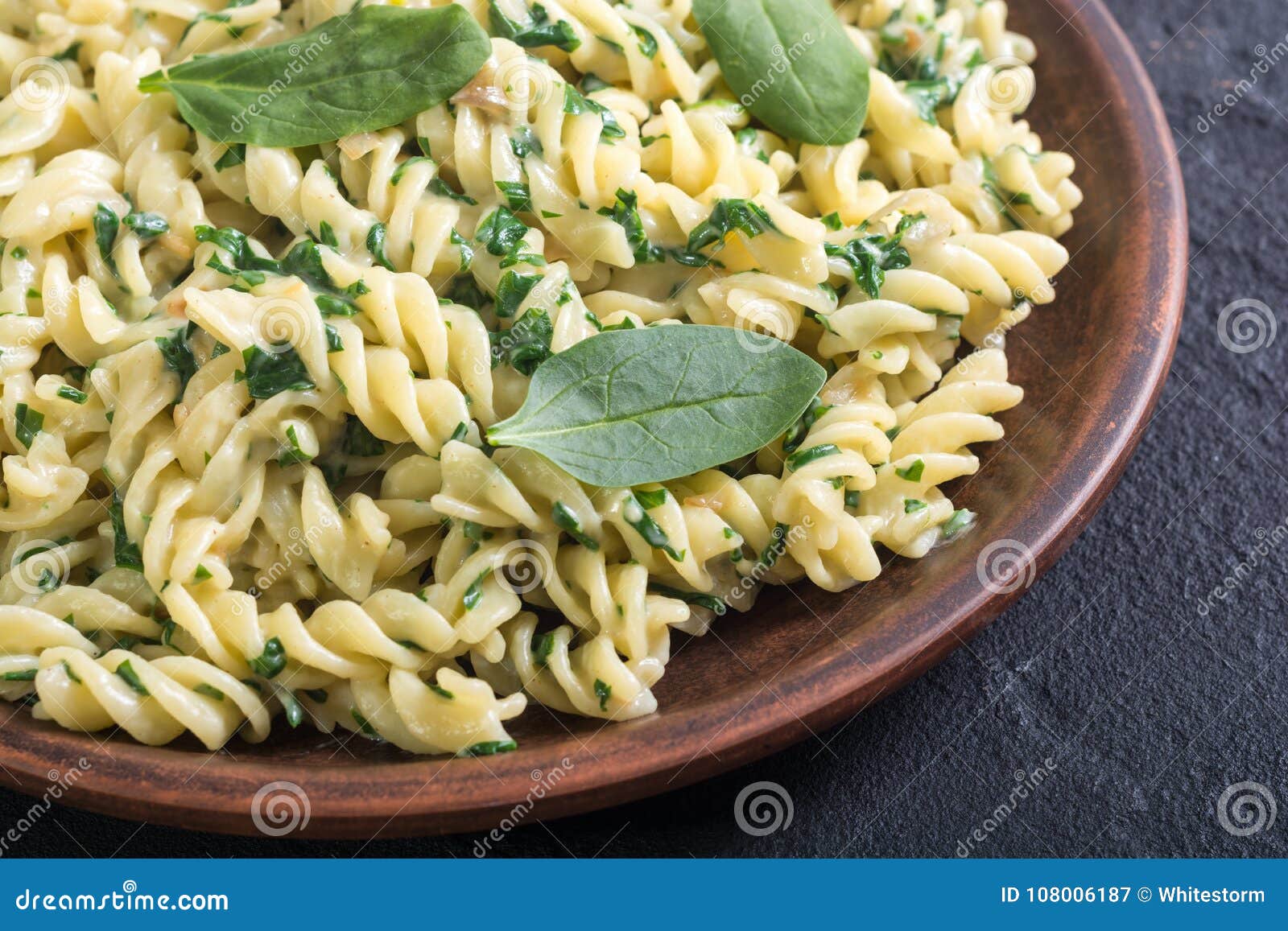 Pasta with baby spinach stock image. Image of dish, lunch - 108006187