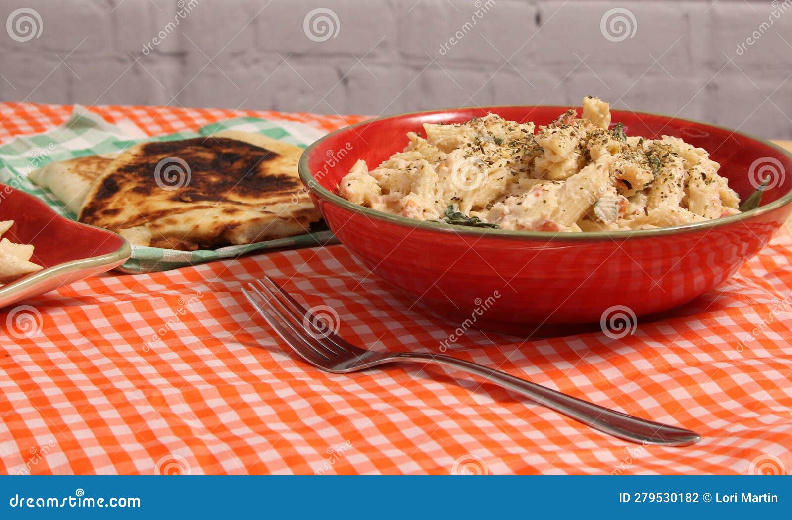 Pasta Carbonara with Italian Flat Bread on Buffet Table Stock Photo