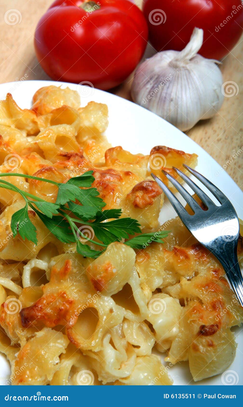 Pasta with cheese sauce stock image. Image of board, garlic - 6135511