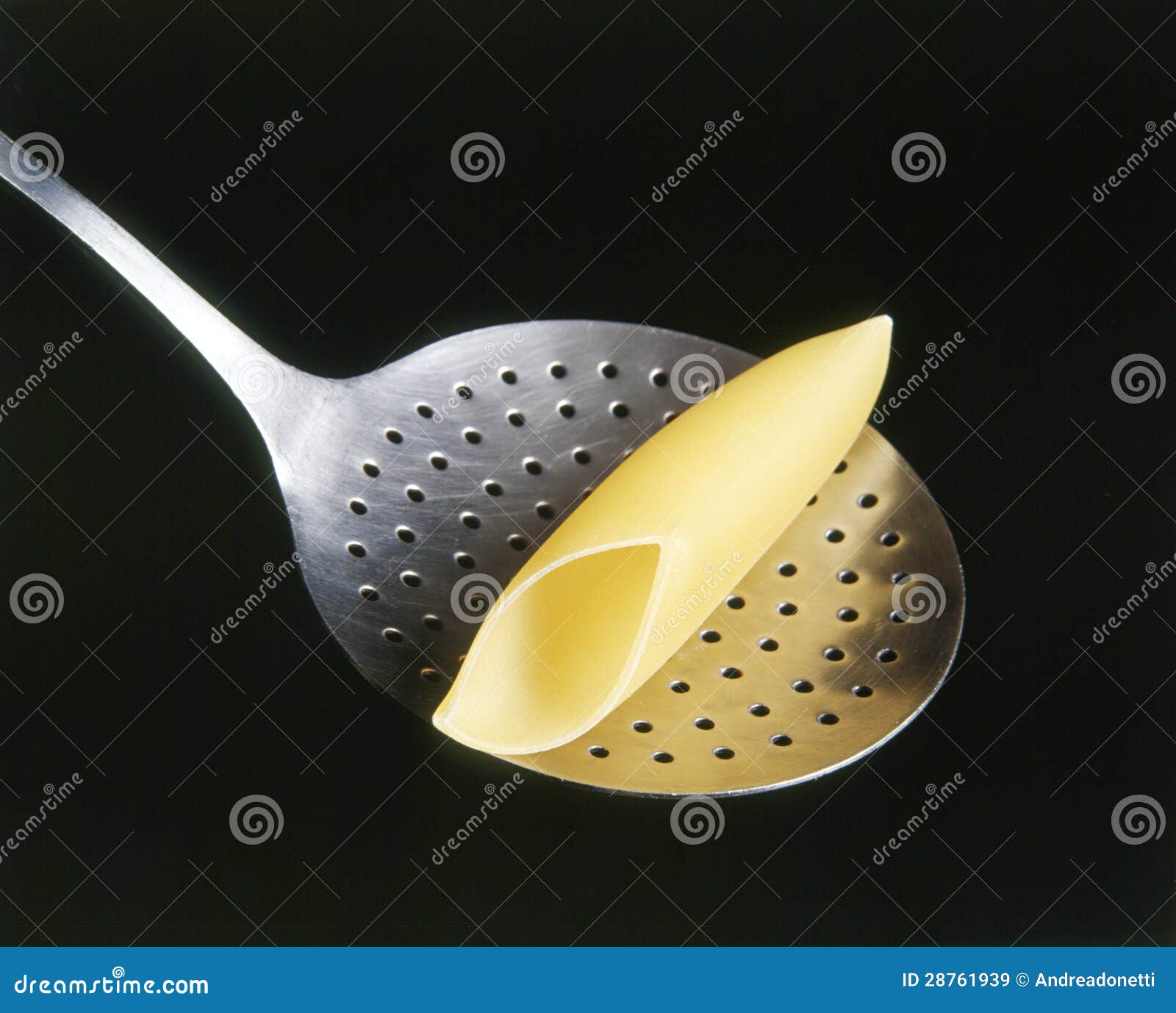 Pasta on a colander spoon stock image. Image of spoon 28761939