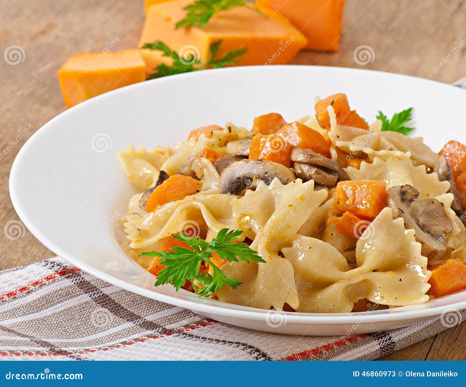 Pasta in Cream Sauce with Slices of Pumpkin and Mushroom Stock Image