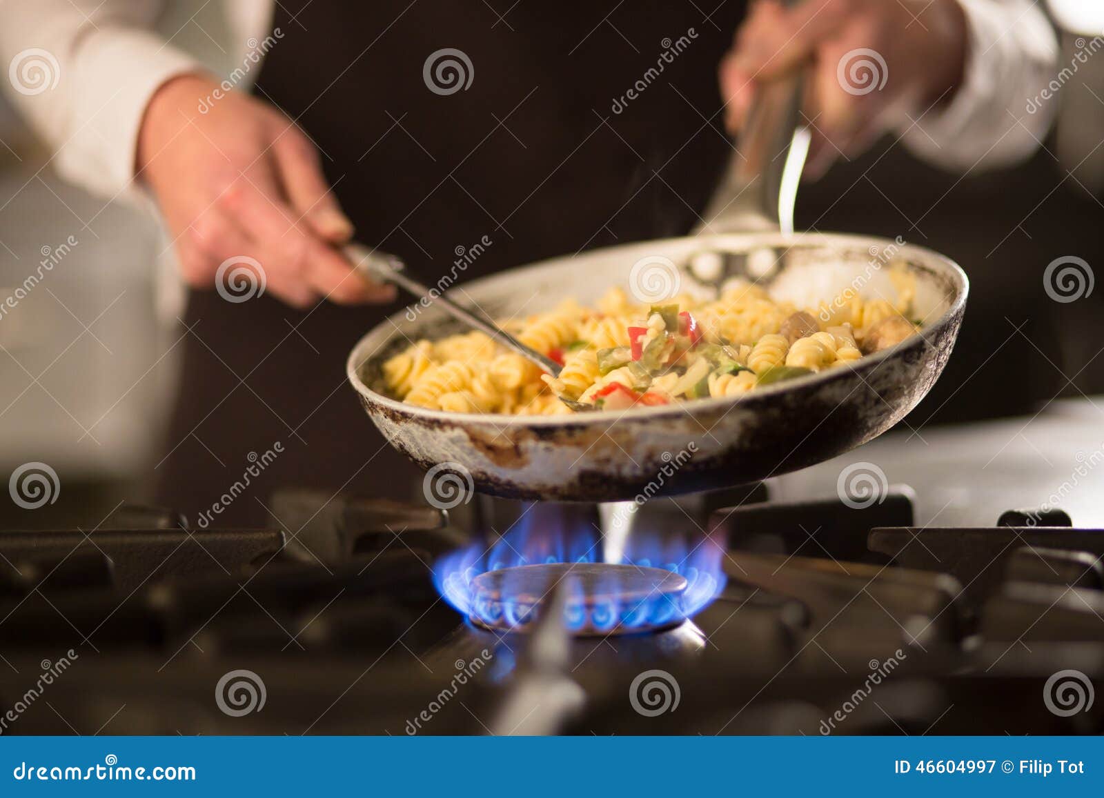 pasta dish with vegetables on stove