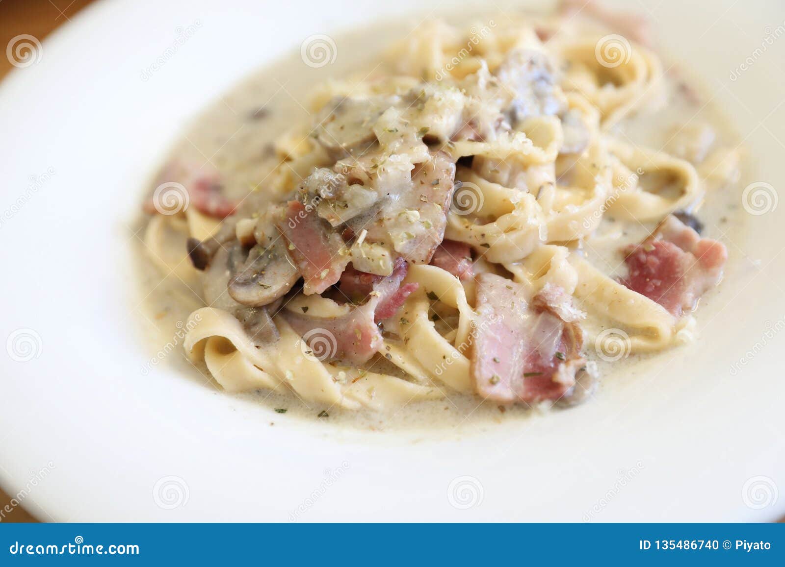 Pasta Fettuccine Alfredo White Sauce with Ham Bacon and Mushroom Stock