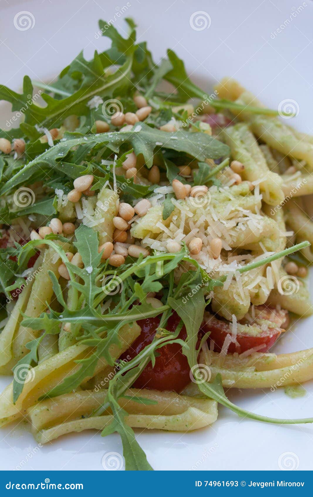 Pasta with Fresh Arugula Salad and Pine Nuts Stock Image Image of