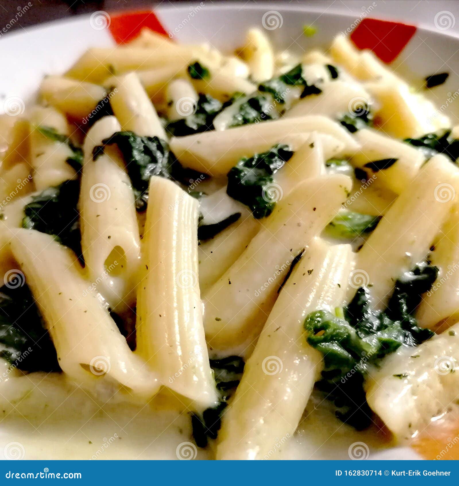 Pasta with Sauce and Spinach Stock Photo Image of pasta