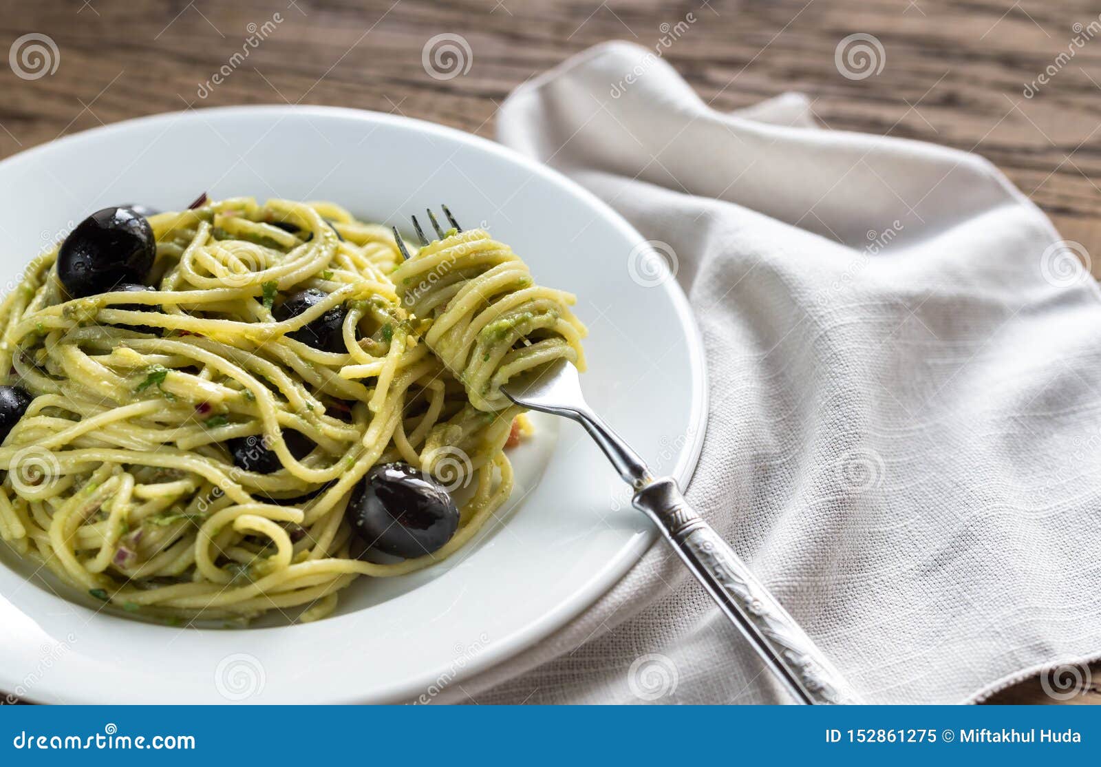 Pasta with Guacamole Sauce and Black Olives Stock Image Image of
