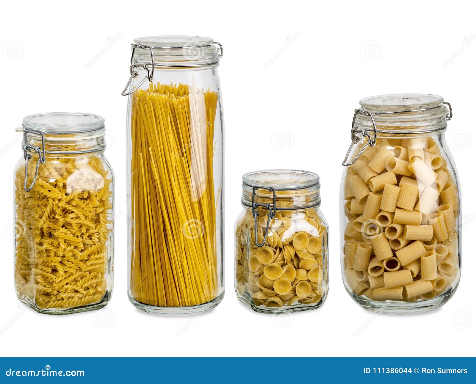Pasta in large glass jars stock photo. Image of rigatoni 111386044
