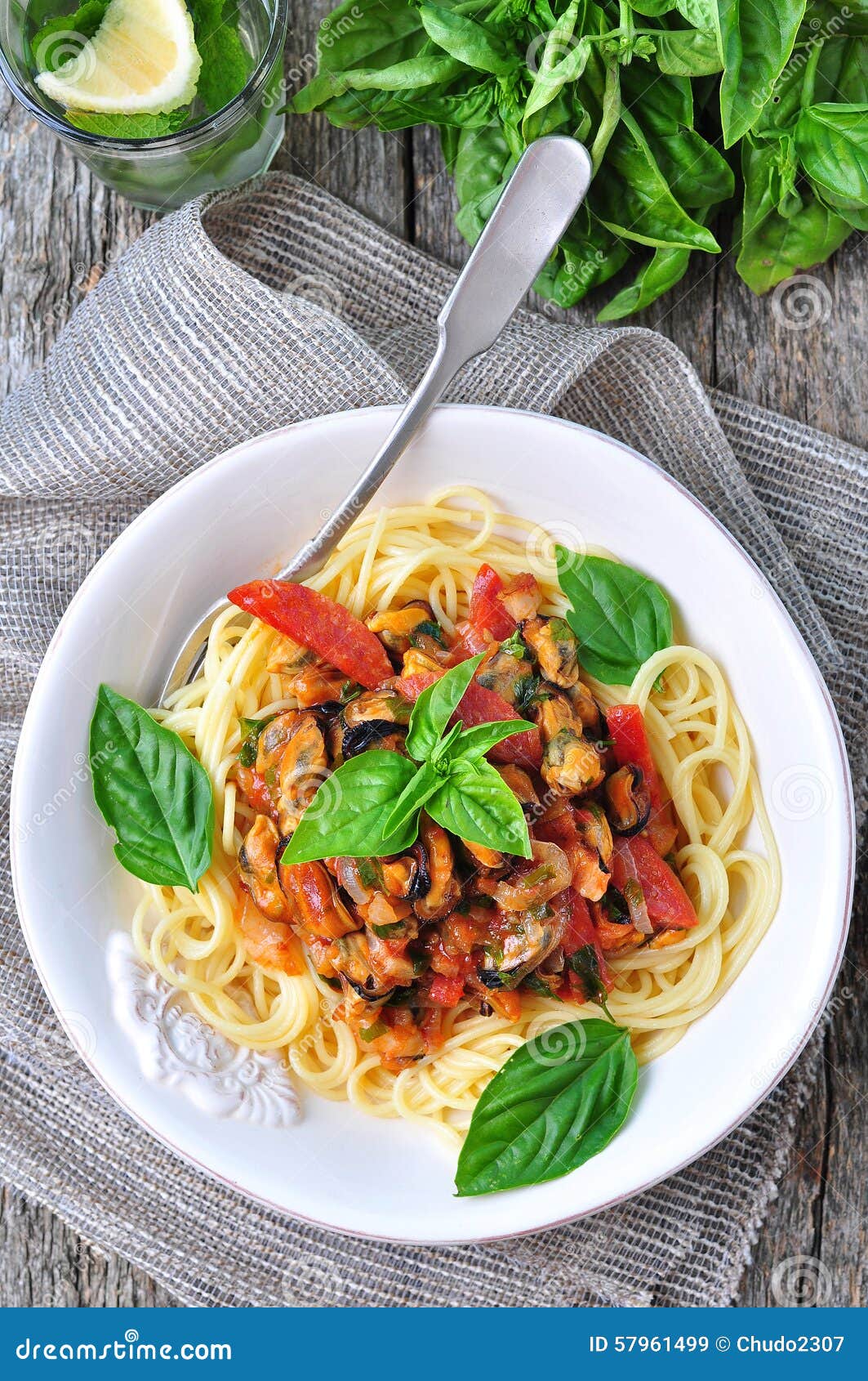 Pasta with Mussels, Pepperoni, Bacon, Tomato and Basil Stock Image