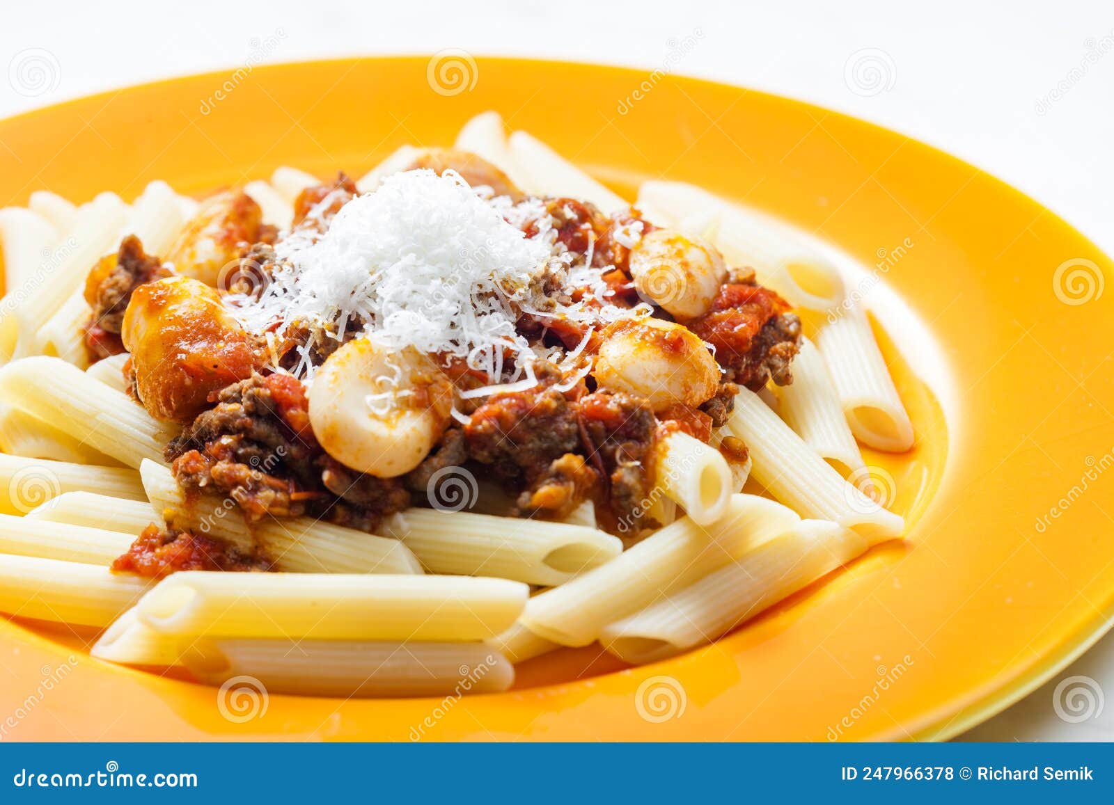 Pasta Penne with Minced Beef Meat and White Beans Stock Photo Image