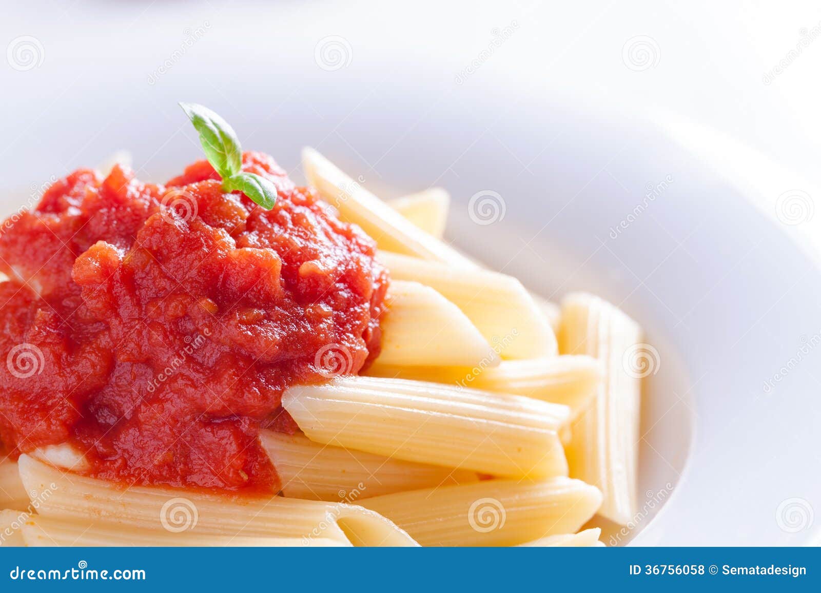 Pasta with red sauce stock photo. Image of lunch, rigatoni