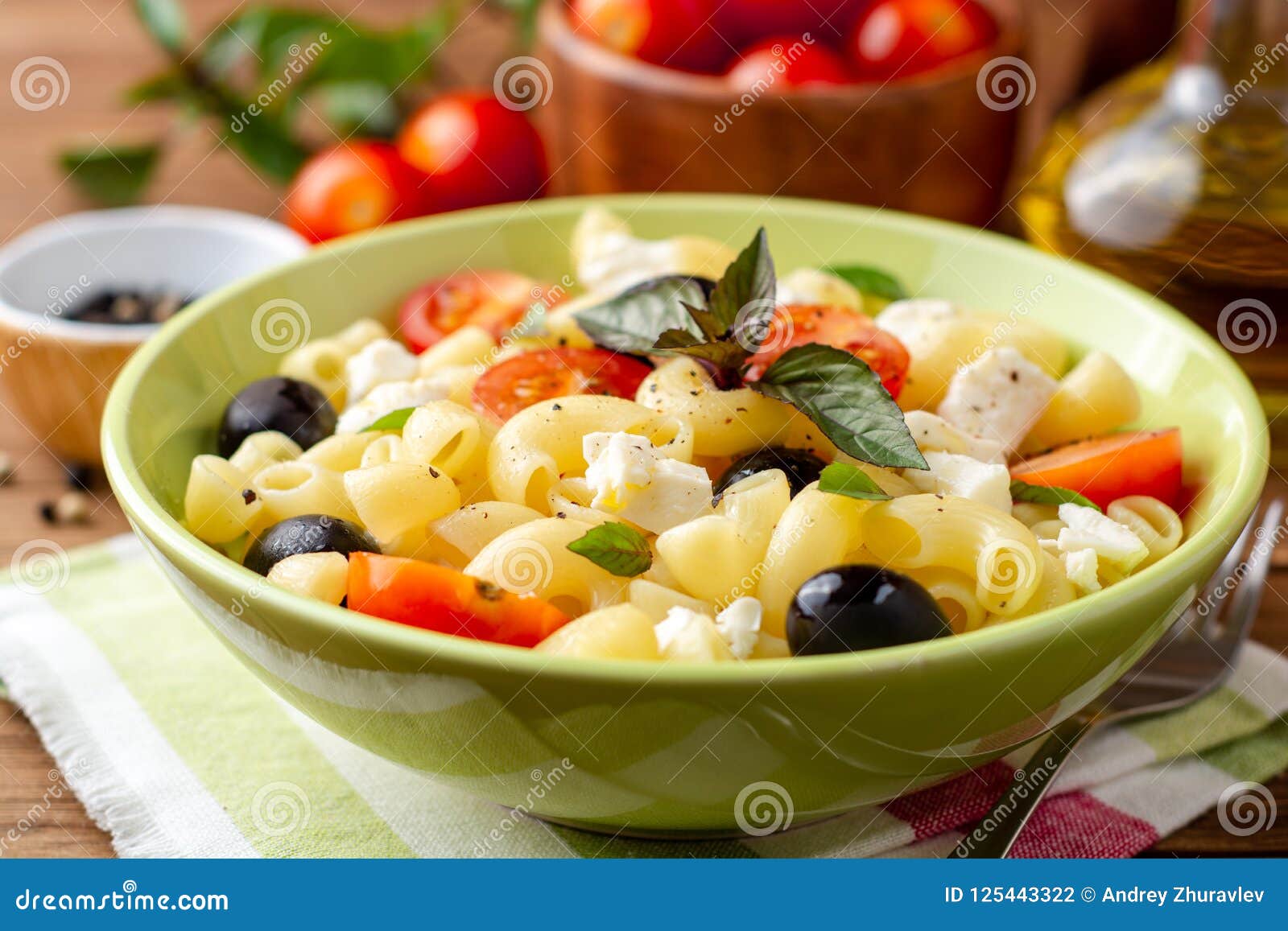 Pasta Salad with Cherry Tomatoes, Black Olives, Feta Cheese and Basil