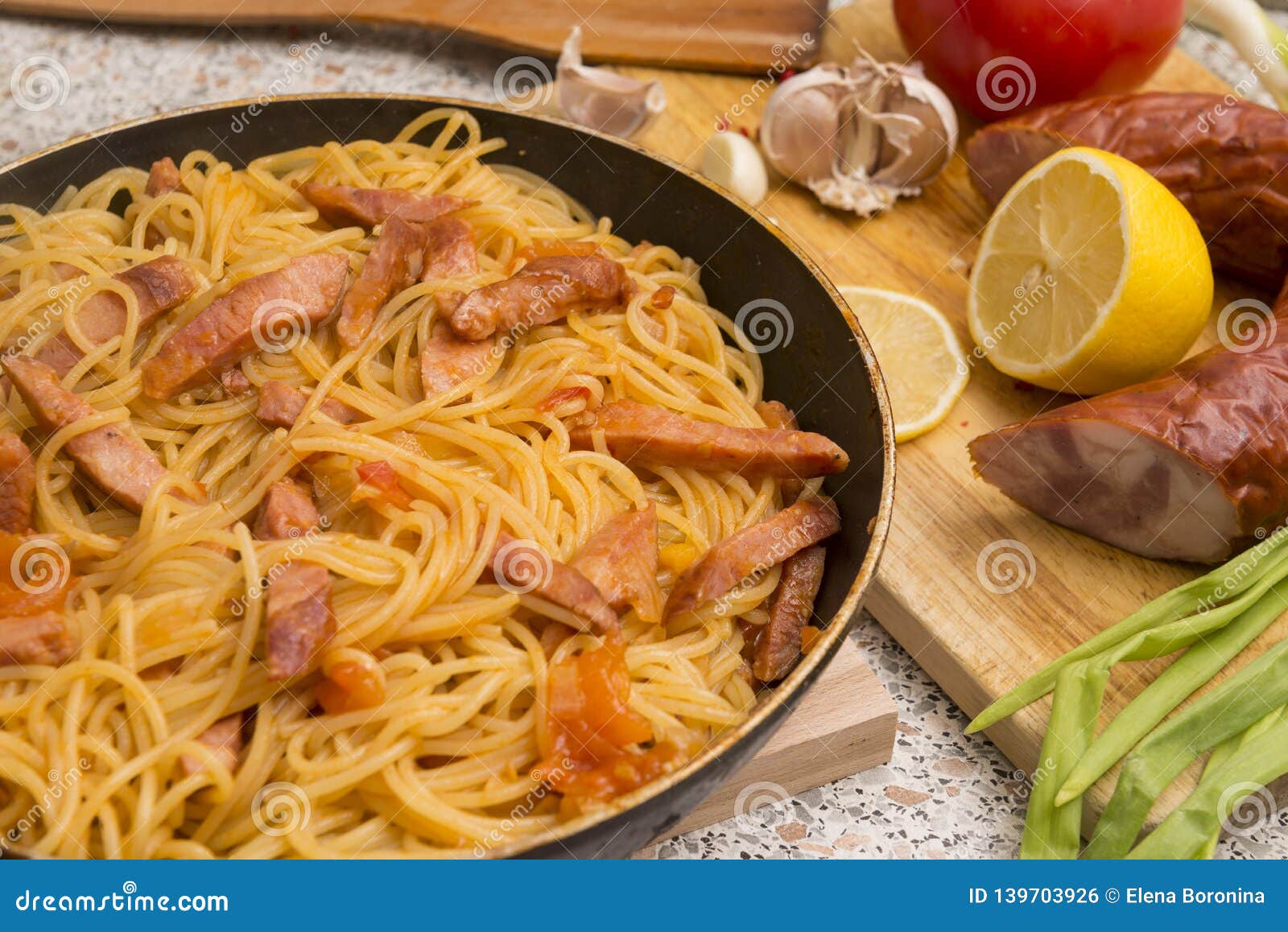 Pasta with Salami in a Pan, Lemon, Garlic Stock Photo Image of onion