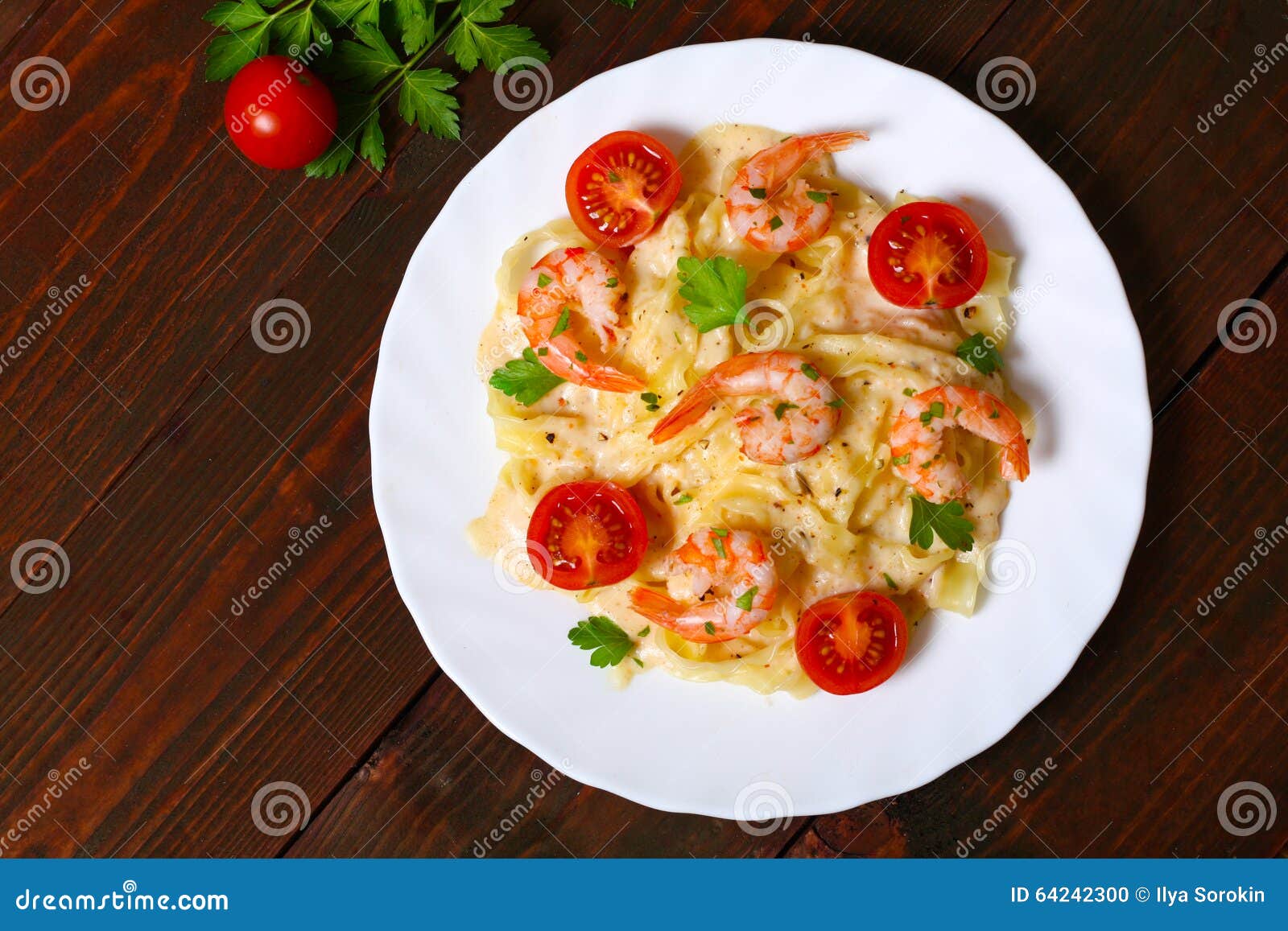 Pasta with Shrimp, Tomatoes, Herbs and Cream Sauce. Stock Photo - Image ...