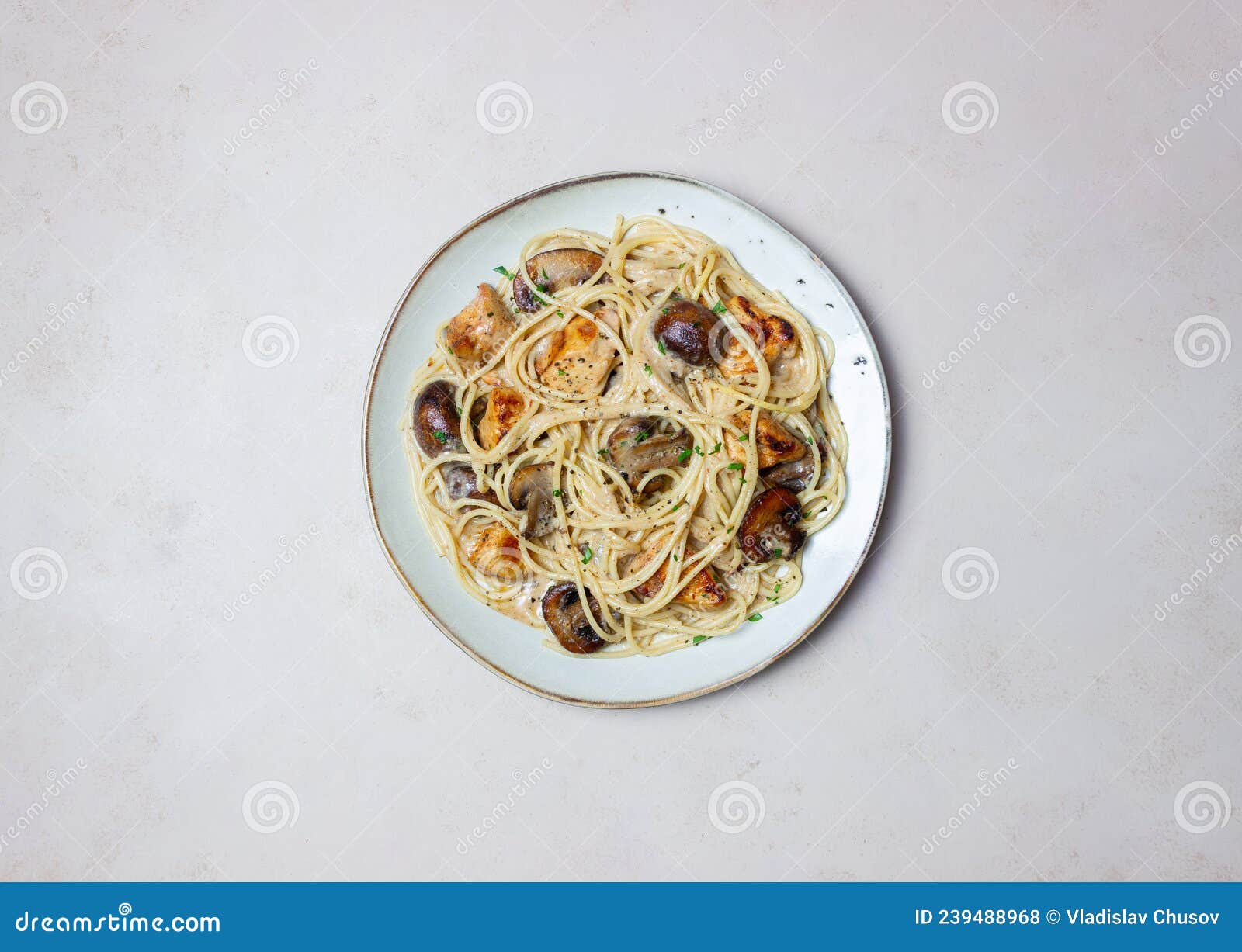 Pasta Spaghetti in a Creamy Sauce with Chicken and Mushrooms. Italian