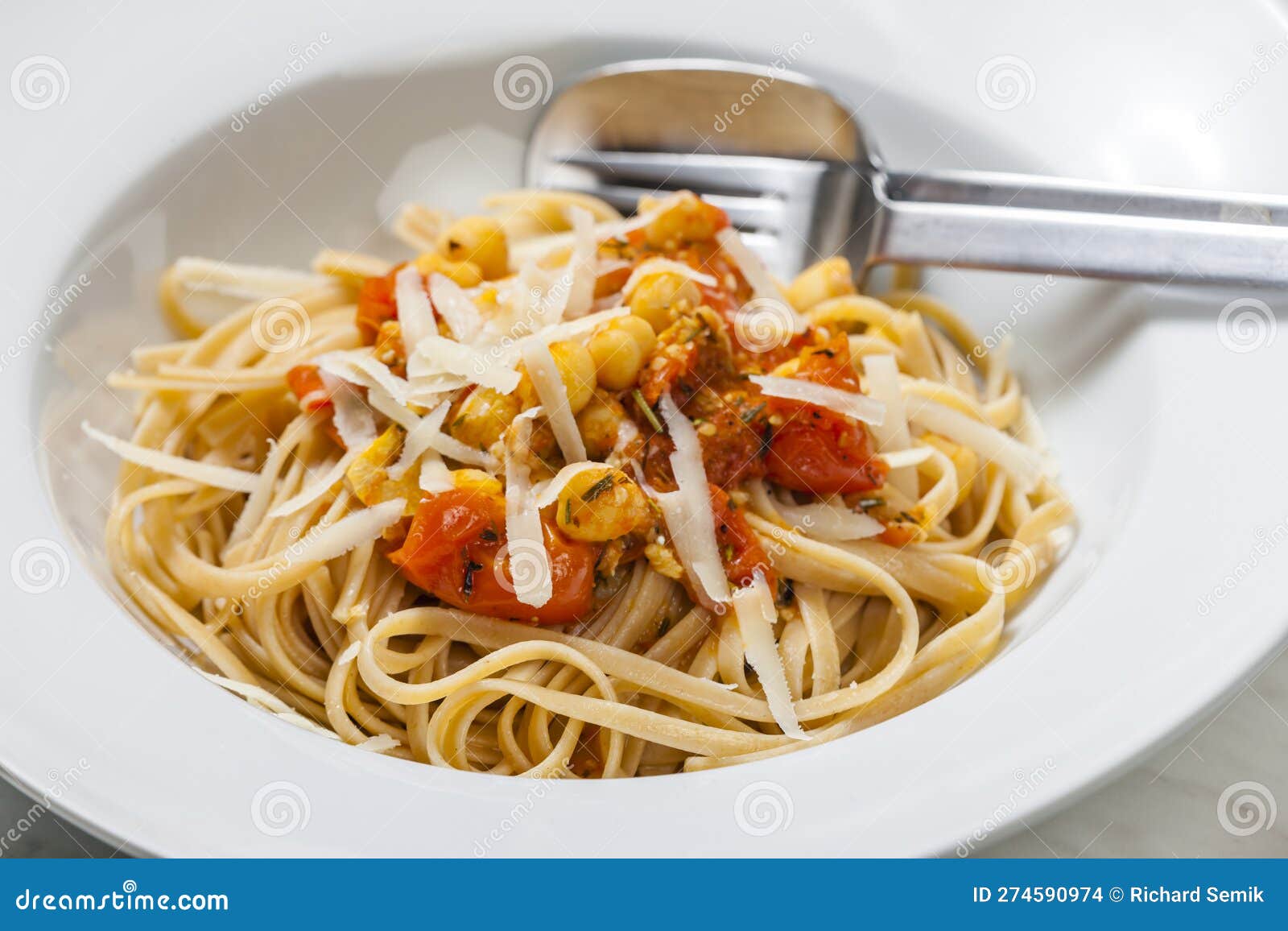Pasta Tagliatelle with Tomato Sauce and Chickpeas Stock Photo Image