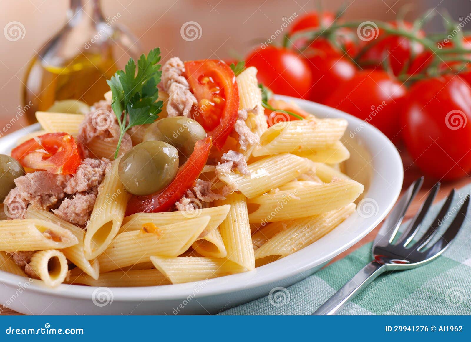 Pasta with tuna and olives stock photo. Image of tomato 29941276