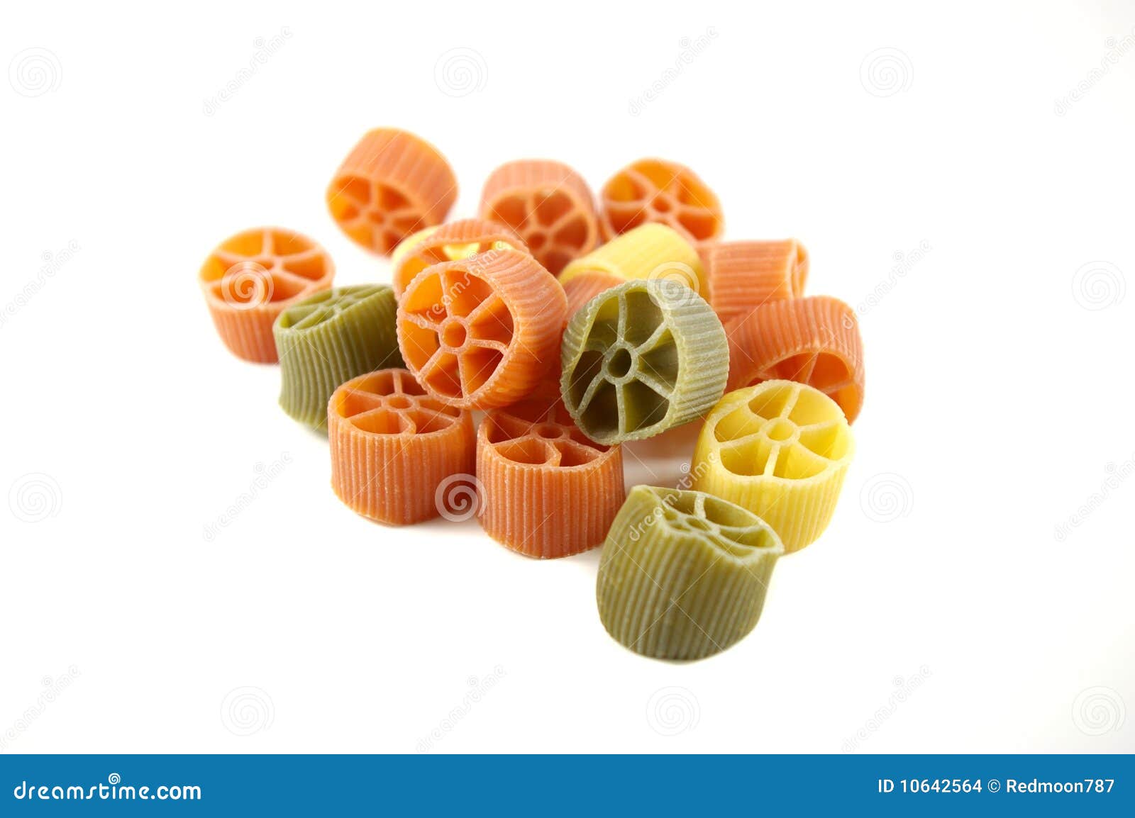 Pasta wheels isolated stock photo. Image of macaroni 10642564