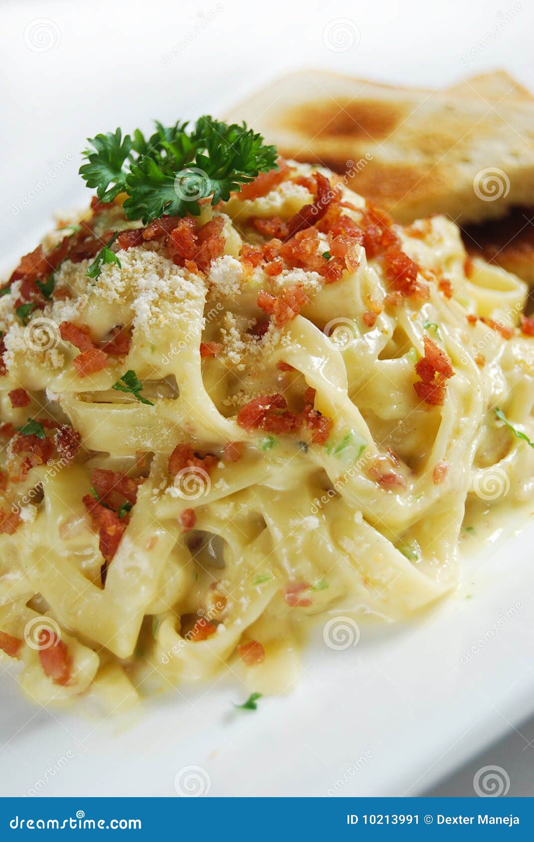 Pasta with white sauce stock image. Image of macaroni 10213991