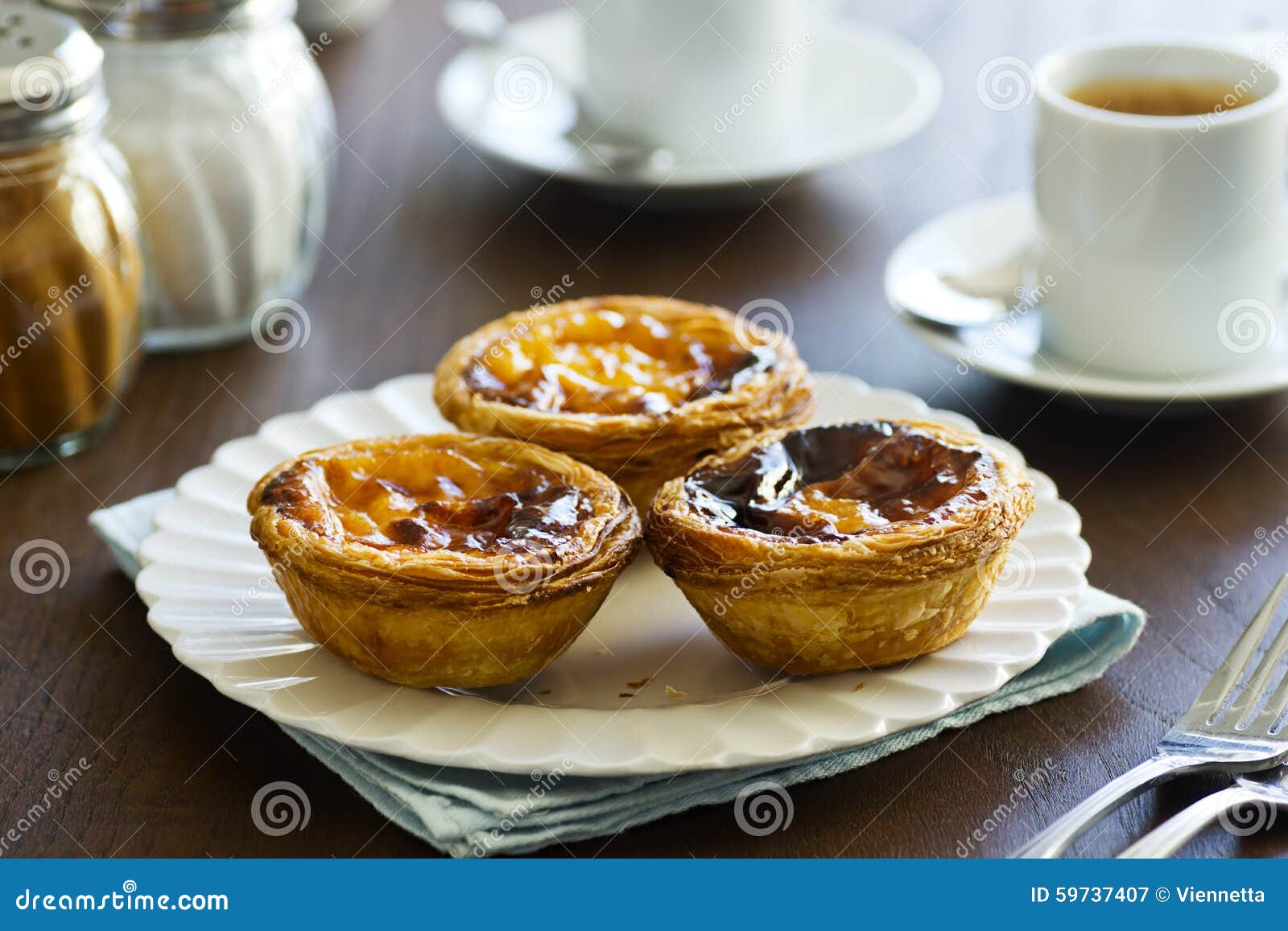 pasteis de nata and espresso in cafe